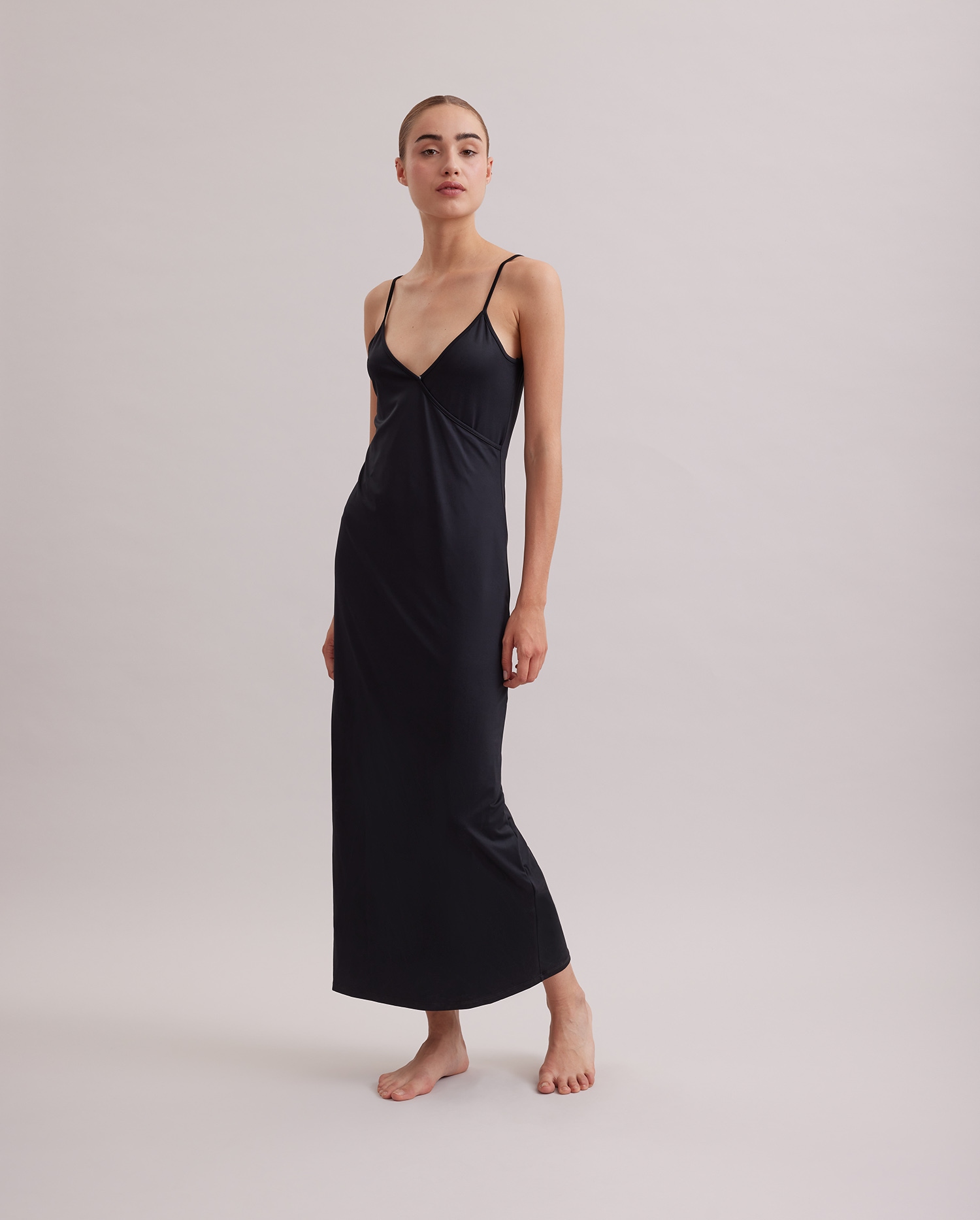 Discover The SANDYA long black maxi dress with thin straps from ANNE FONTAINE