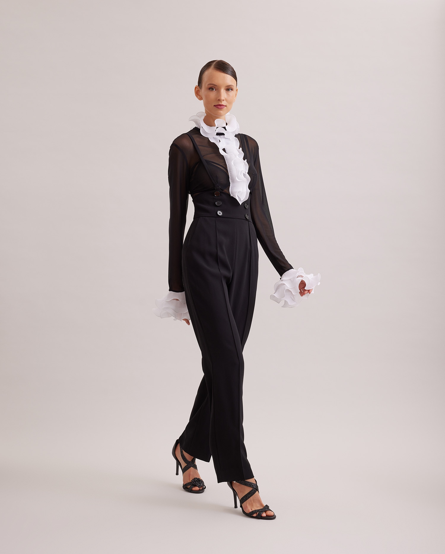 Discover The BLAKE Black suspender pant featuring cummerbund waist and button details from ANNE FONTAINE