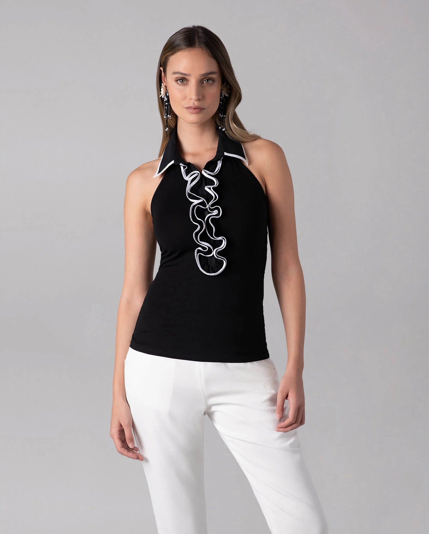 Discover The CYPRIA Black and White, Sleeveless, Halter Style Top With Point Collar from ANNE FONTAINE