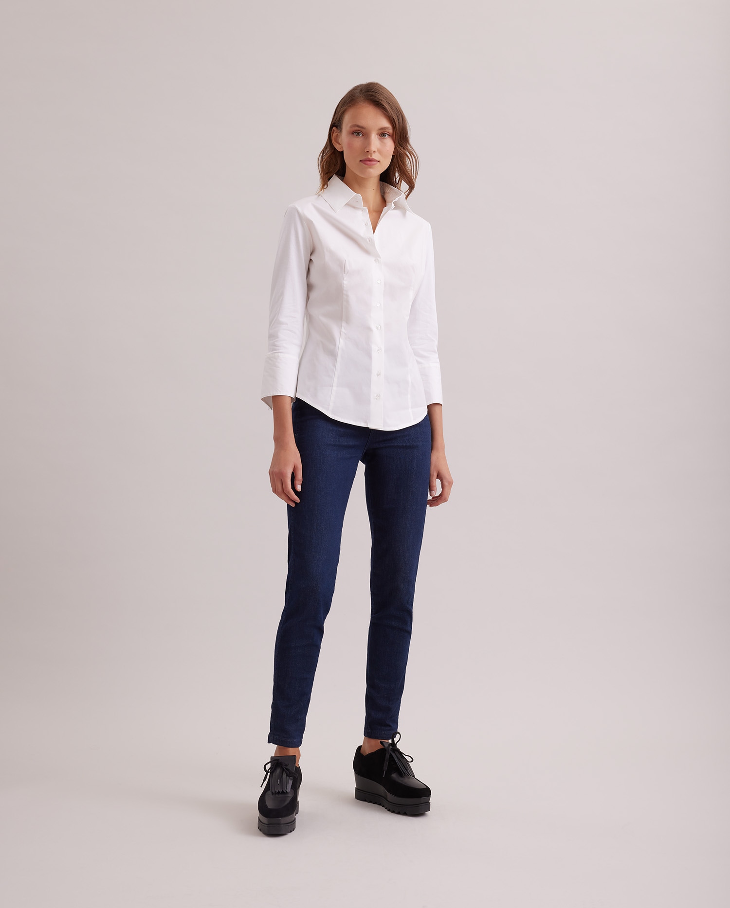Discover the CONNIE 3/4 Sleeve T-Blouse With Swallow Cuffs