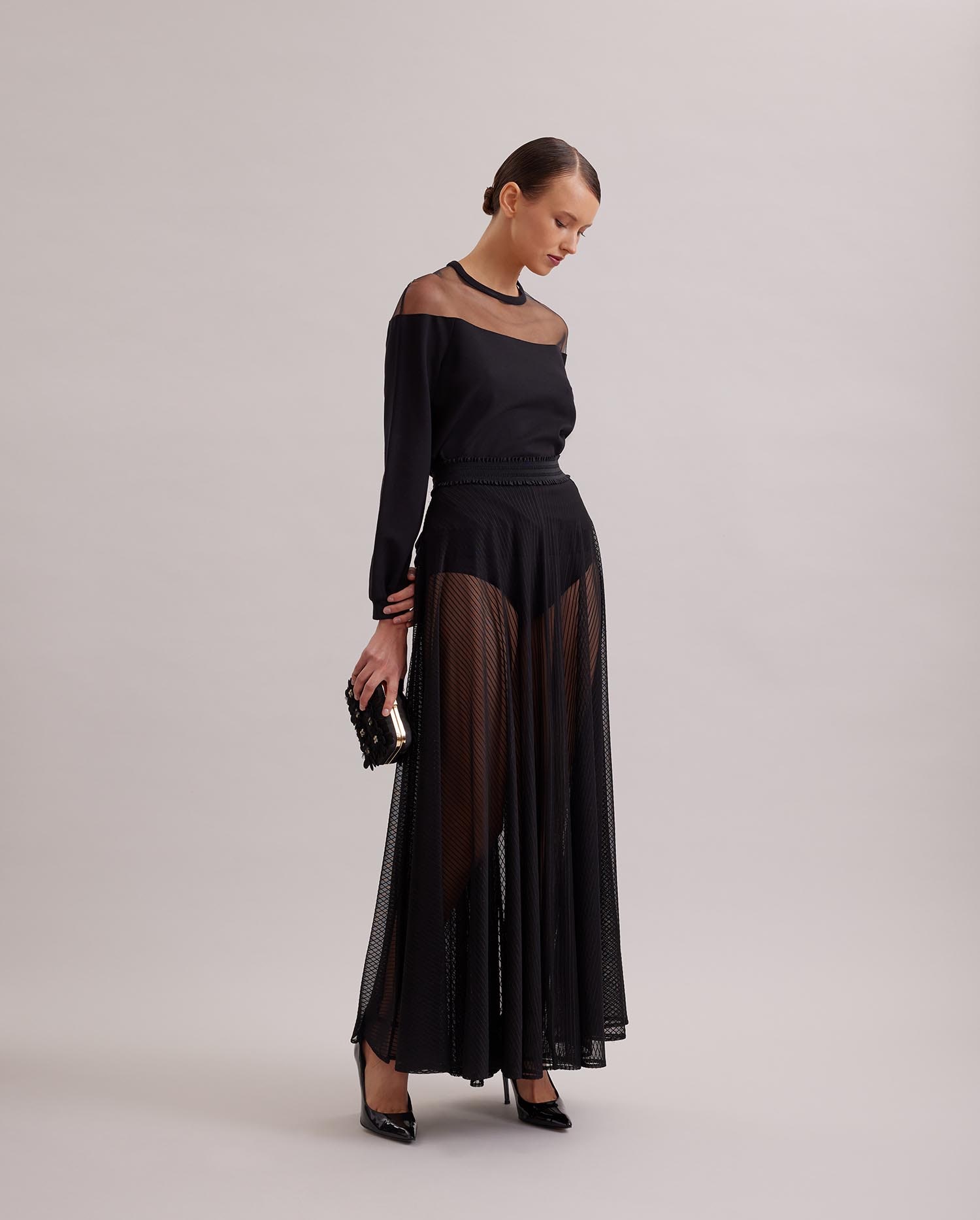 Discover The LUNE Long sheer circle skirt with elastic ruffle waistband from ANNE FONTAINE