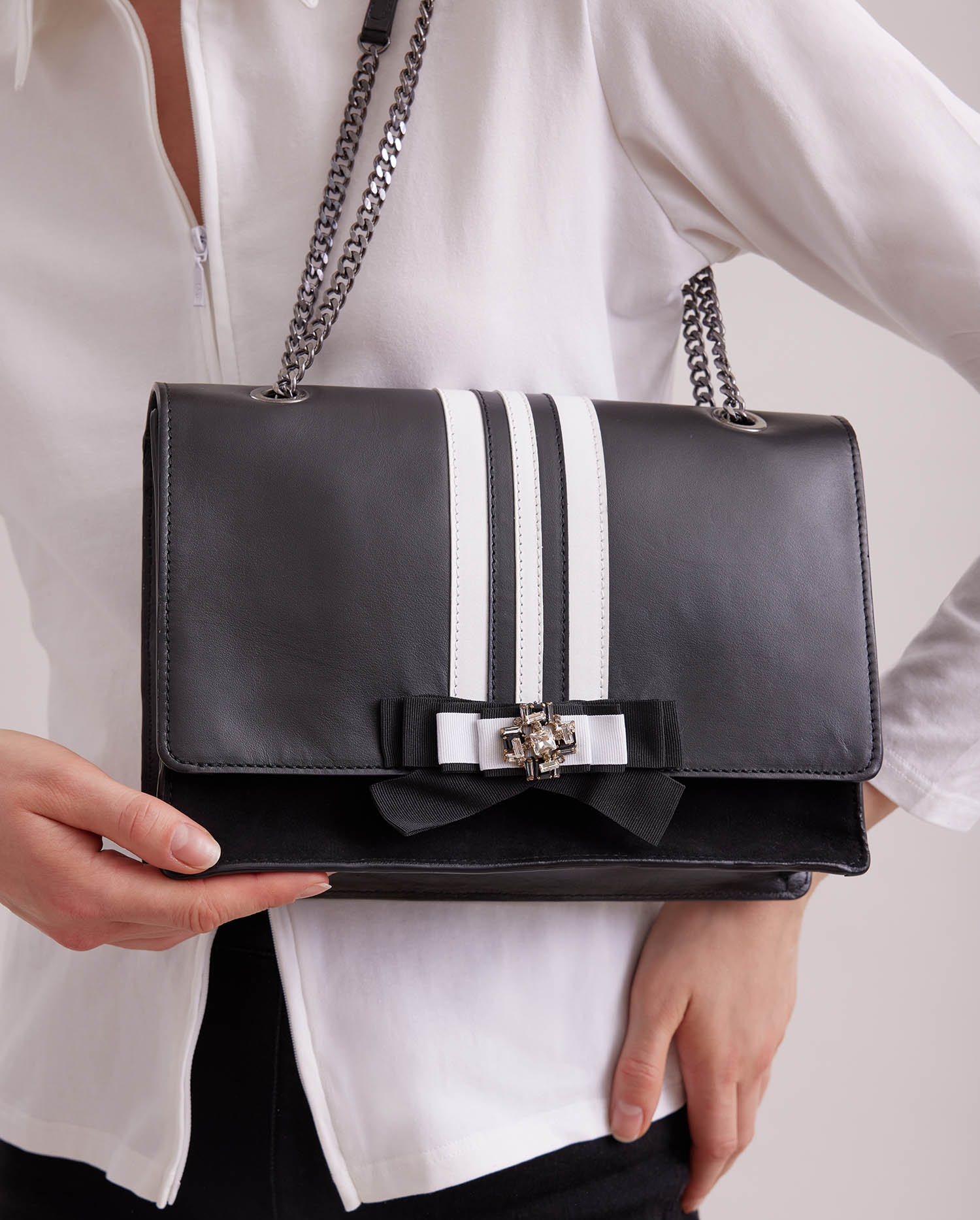 Discover The ONIGHT Suede and leather handbag in black & white from ANNE FONTAINE