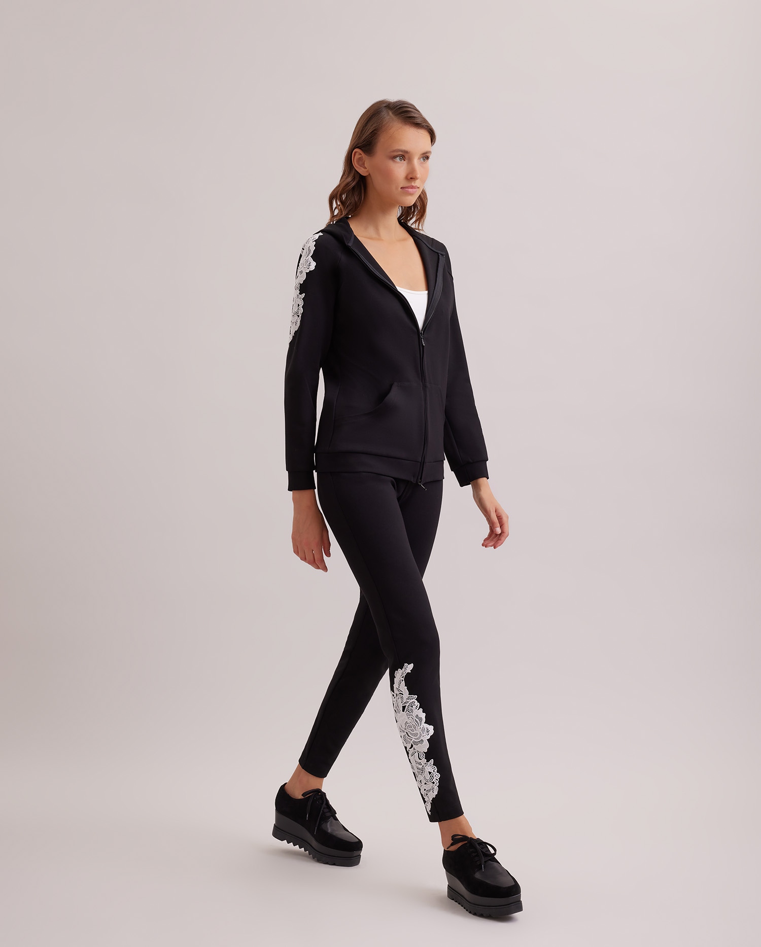 Disocver the LUCILE Black knit legging with white lace applique from ANNE FONTAINE