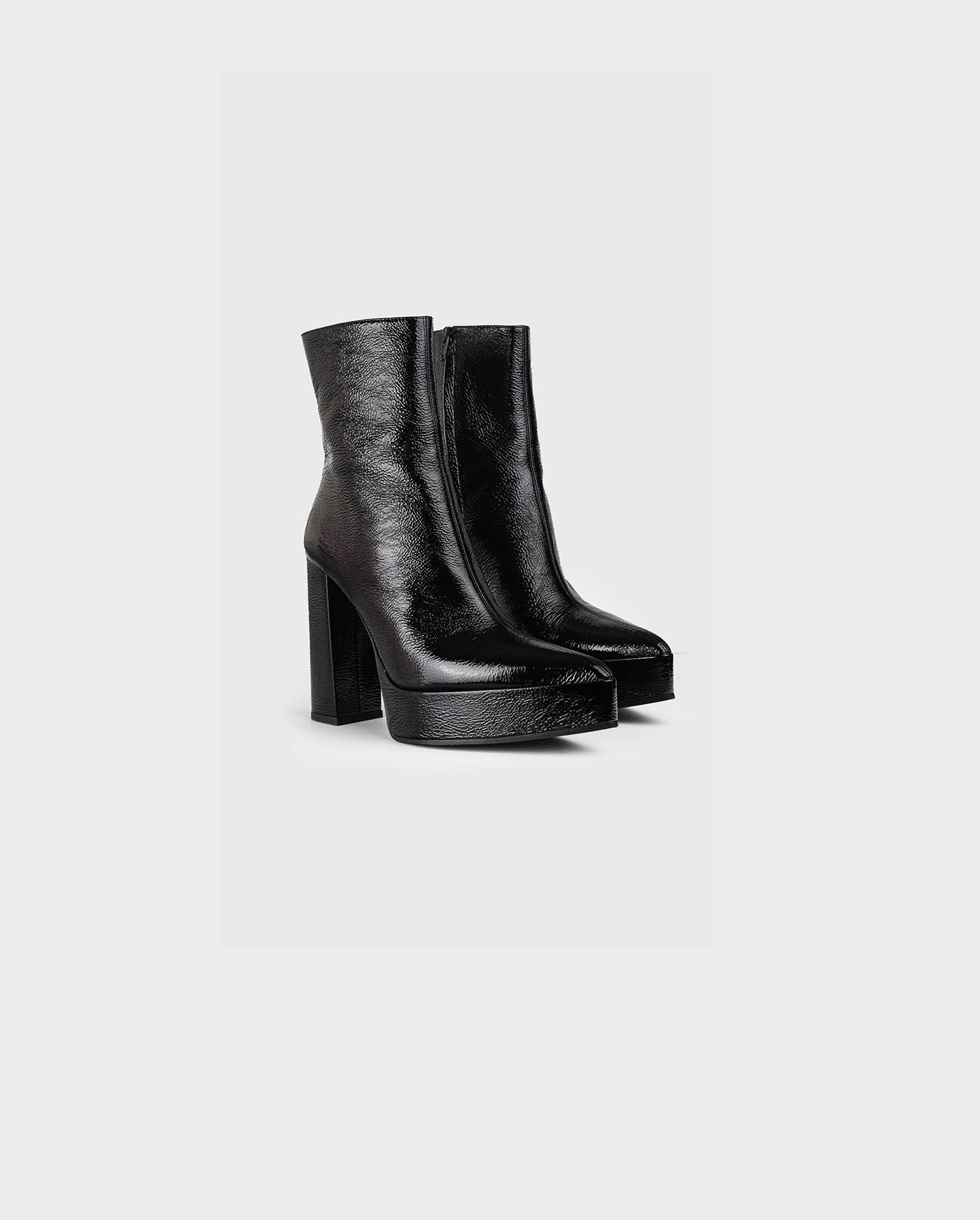 Discover the ADEN Patent Leather Platform Boot
