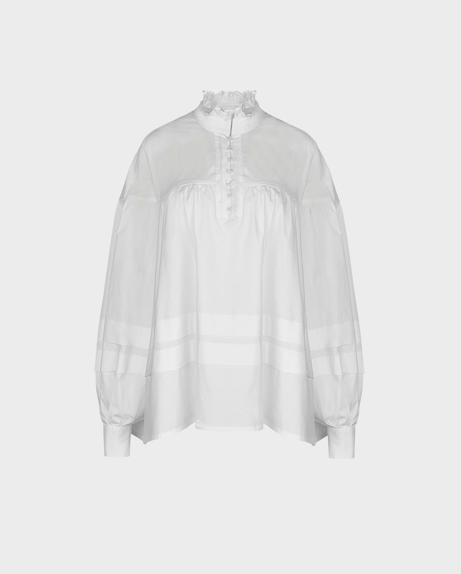 Discover The AMANTINE Long sleeve white shirt with half-button placket and double horizontal overlay flaps from ANNE FONTAINE