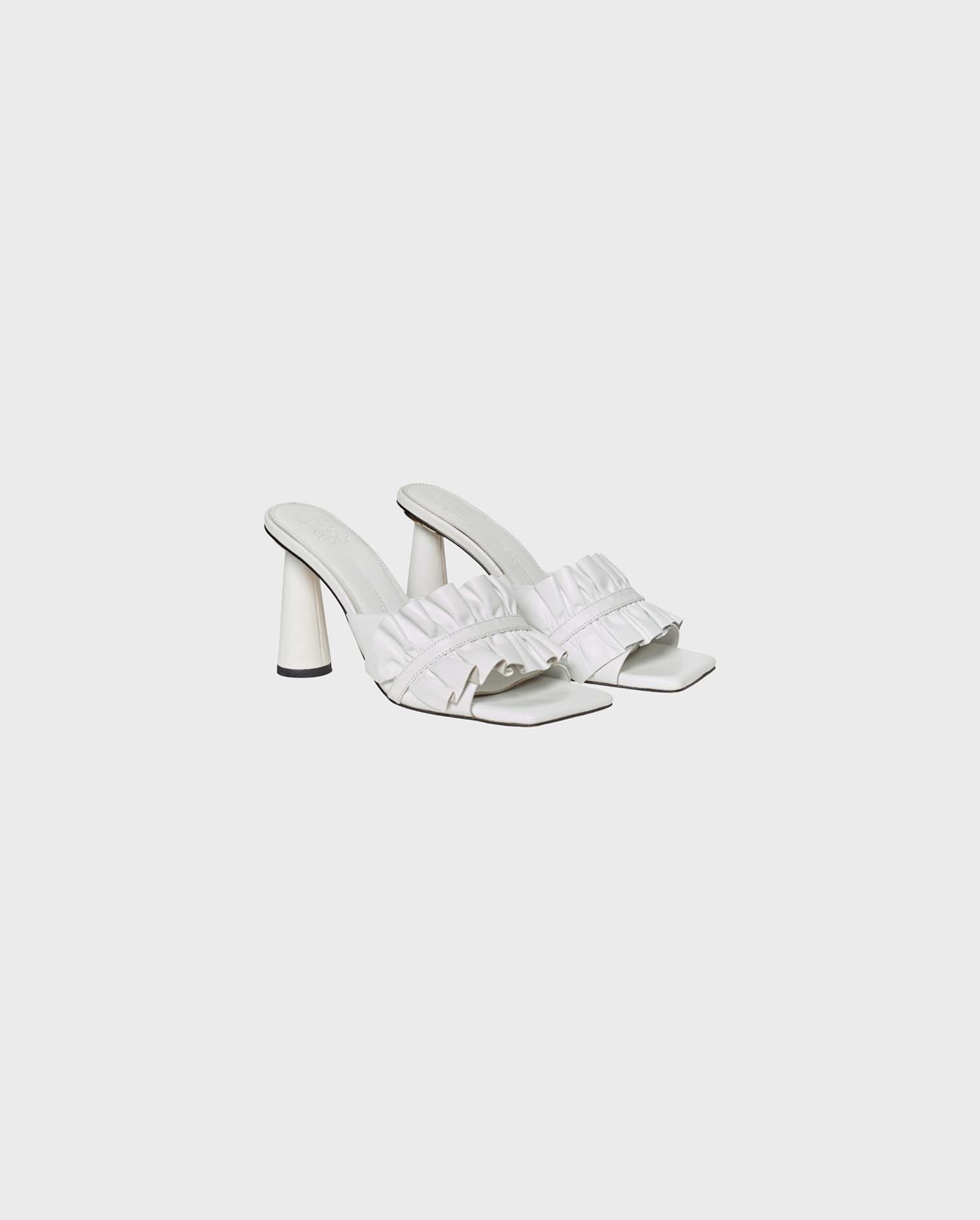 Discover The AMOROSA White Leather Slides With Ruffle Detail From ANNE FONTAINE