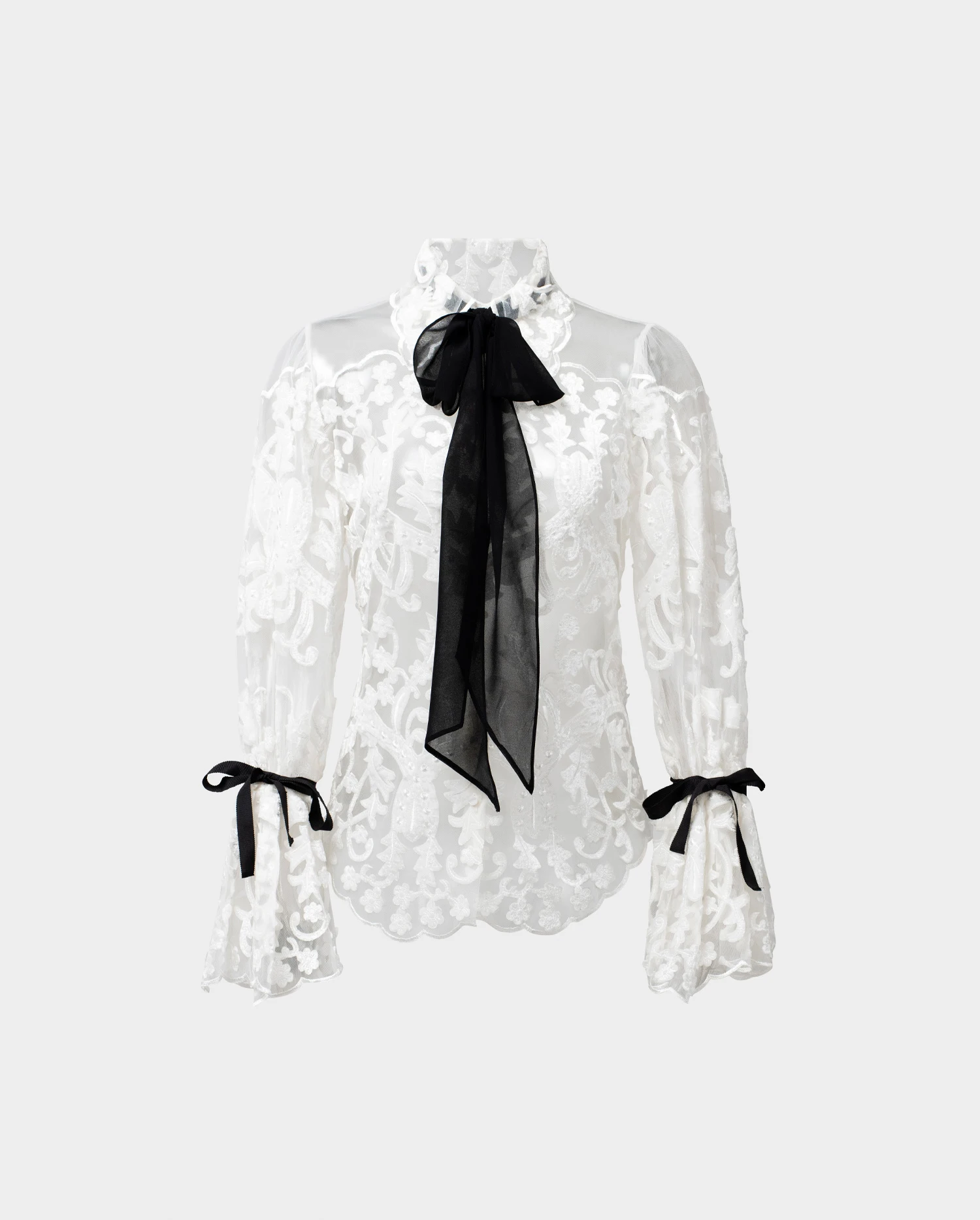 Discover The Semi-sheer white embroidered lace shirt with removable ties from ANNE FONTAINE