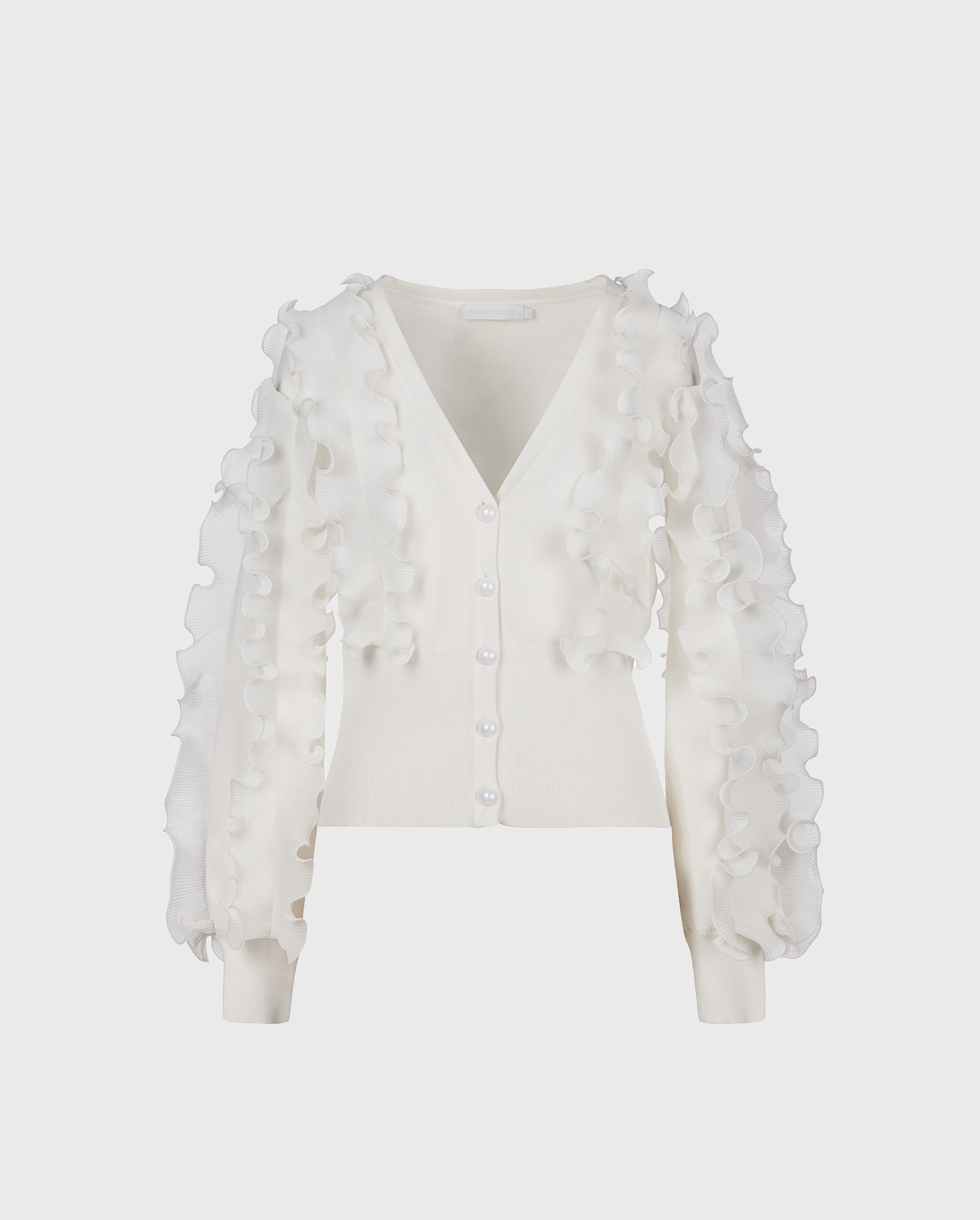 Discover The CILINE Long sleeve ruffle covered cardigan in white from ANNE FONTAINE