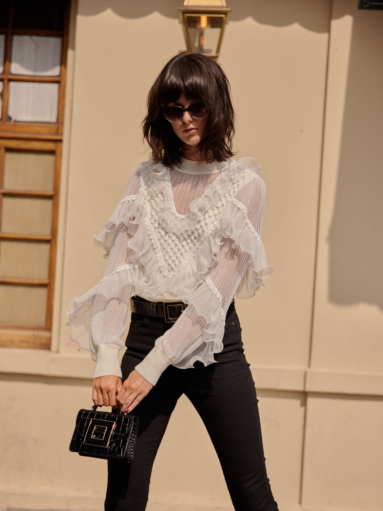 Discover The OEUVRE Long sleeve white knit with sheer details and cascading ruffles from ANNE FONTAINE