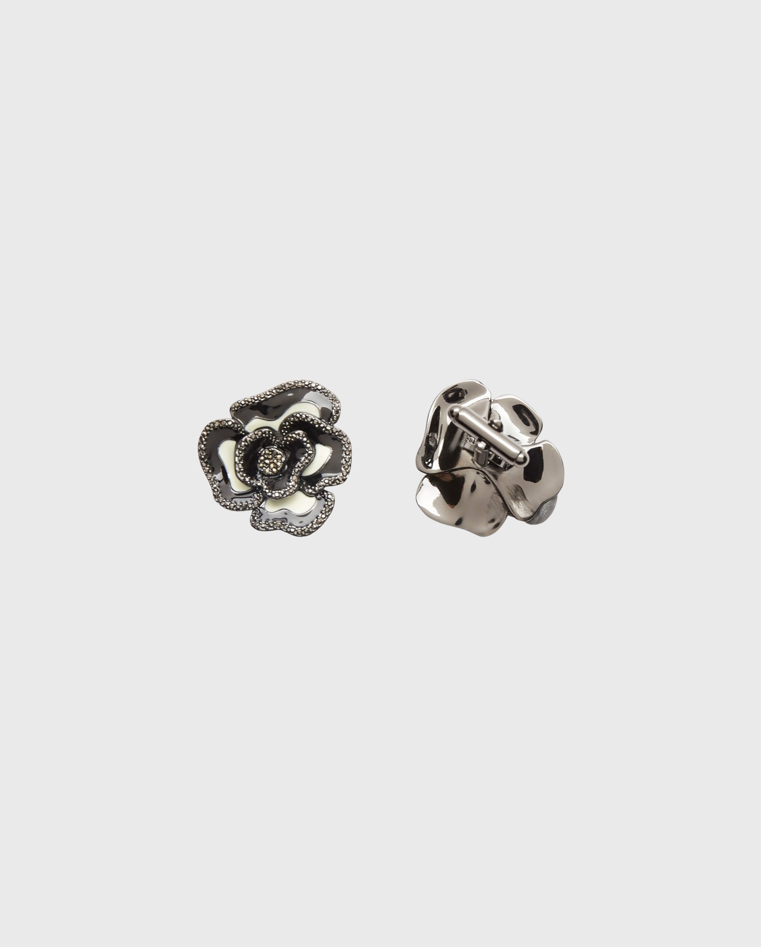 Discover the FINN Black and white enamel floral cufflinks with crystals from ANNE FONTAINE