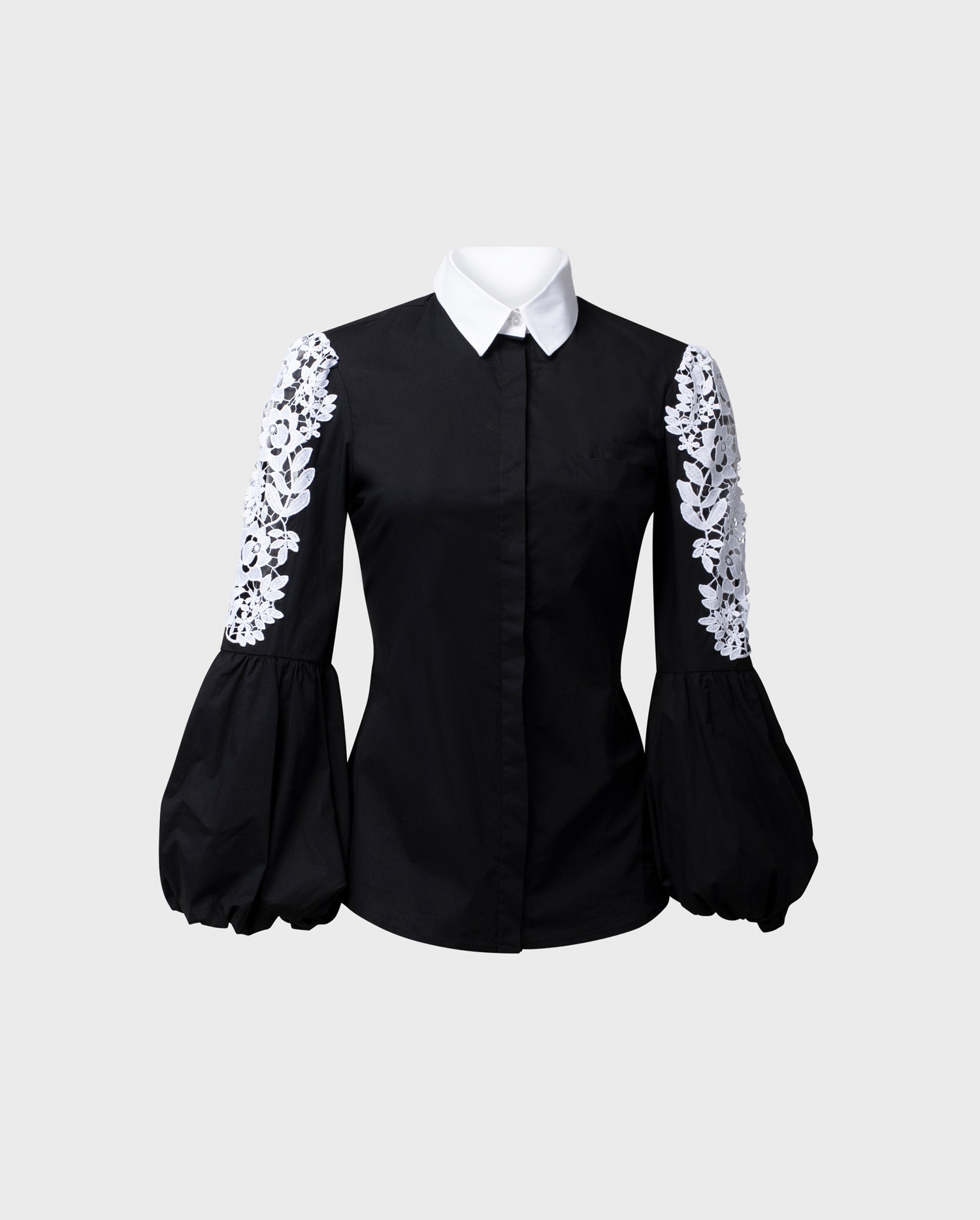 Discover The LAORA black and white balloon sleeve shirt with intricate floral embroidery from ANNE FONTAINE