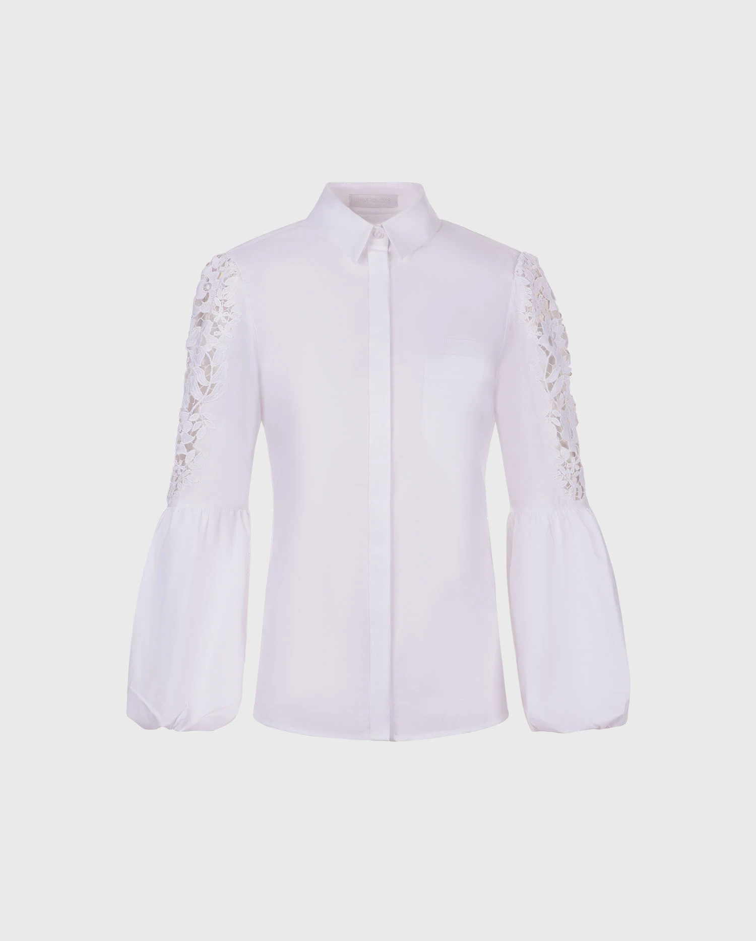 Discover the LAORA White balloon sleeve shirt with intricate floral embroidery from ANNE FONTAINE