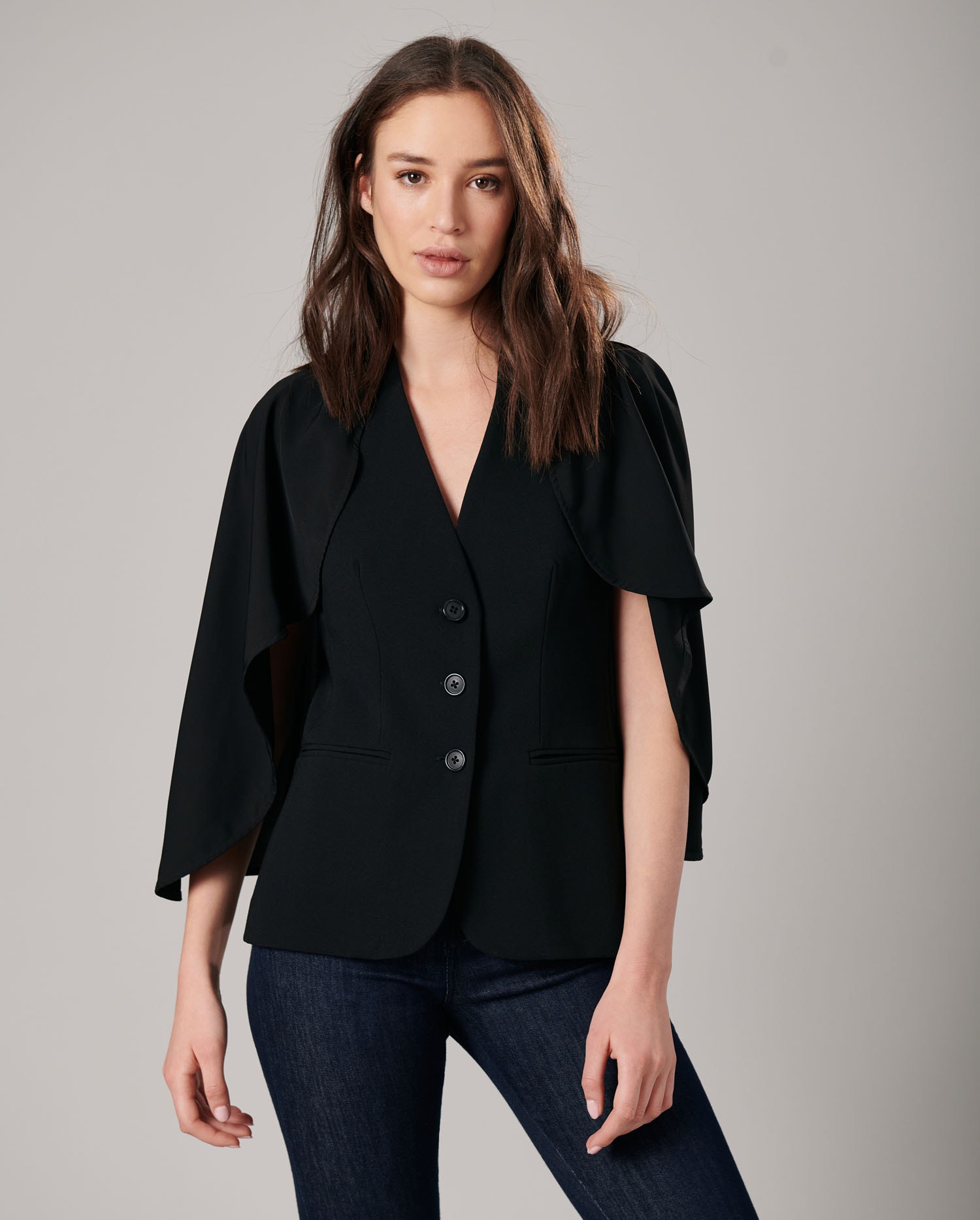 Discover The MYLIANE ¾ Sleeve Crepe Black Jacket With a Flowing Cape from ANNE FONTAINE