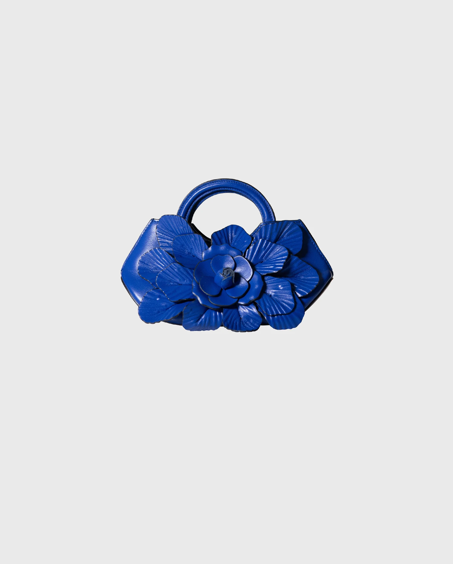 Discover The SCARLETT-MINI Signature leather mini floral handbag in ultra blue from ANNE FONTAINE