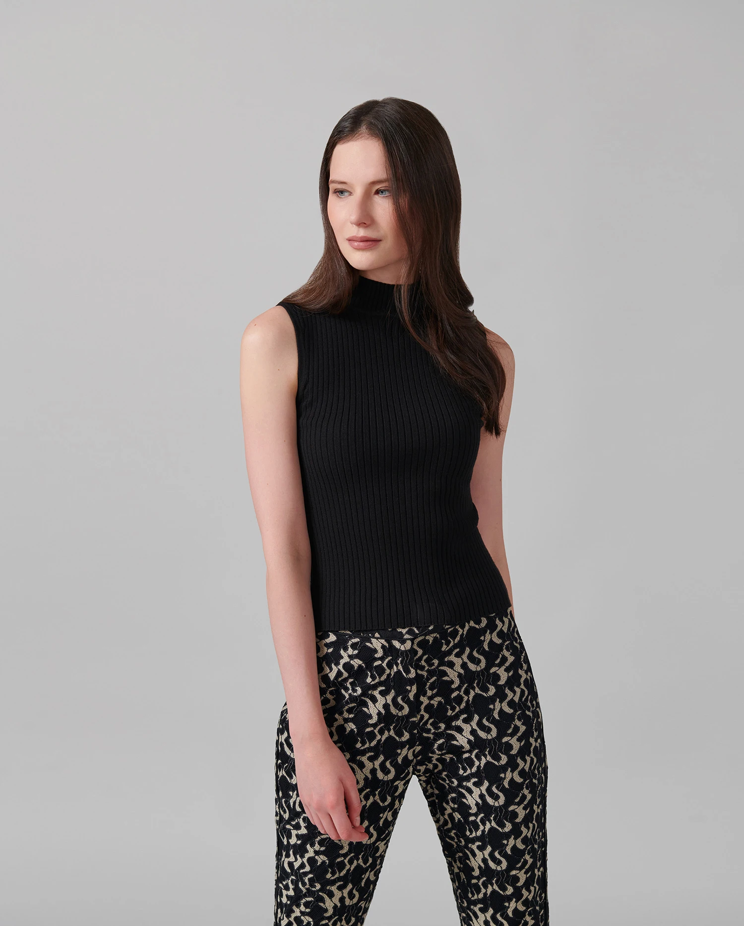 Discover The SOLO Sleeveless black ribbed mockneck knit from ANNE FONTAINE