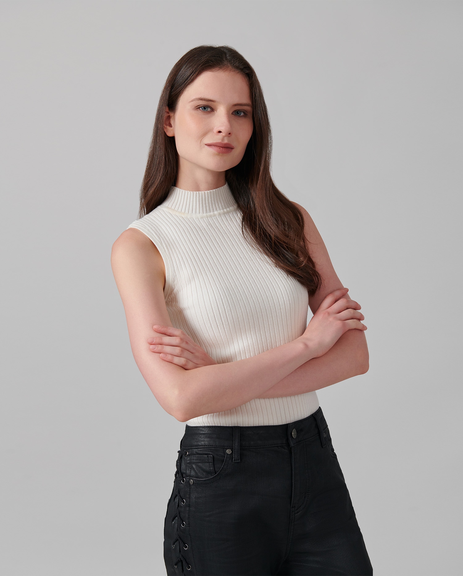 Discover The SOLO Sleeveless white ribbed mockneck knit from ANNE FONTAINE