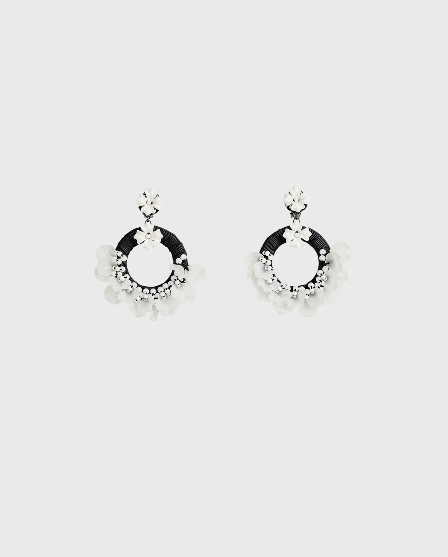 Discover The TANA Black Textured Hoop Earrings With White Flowers From ANNE FONTAINE