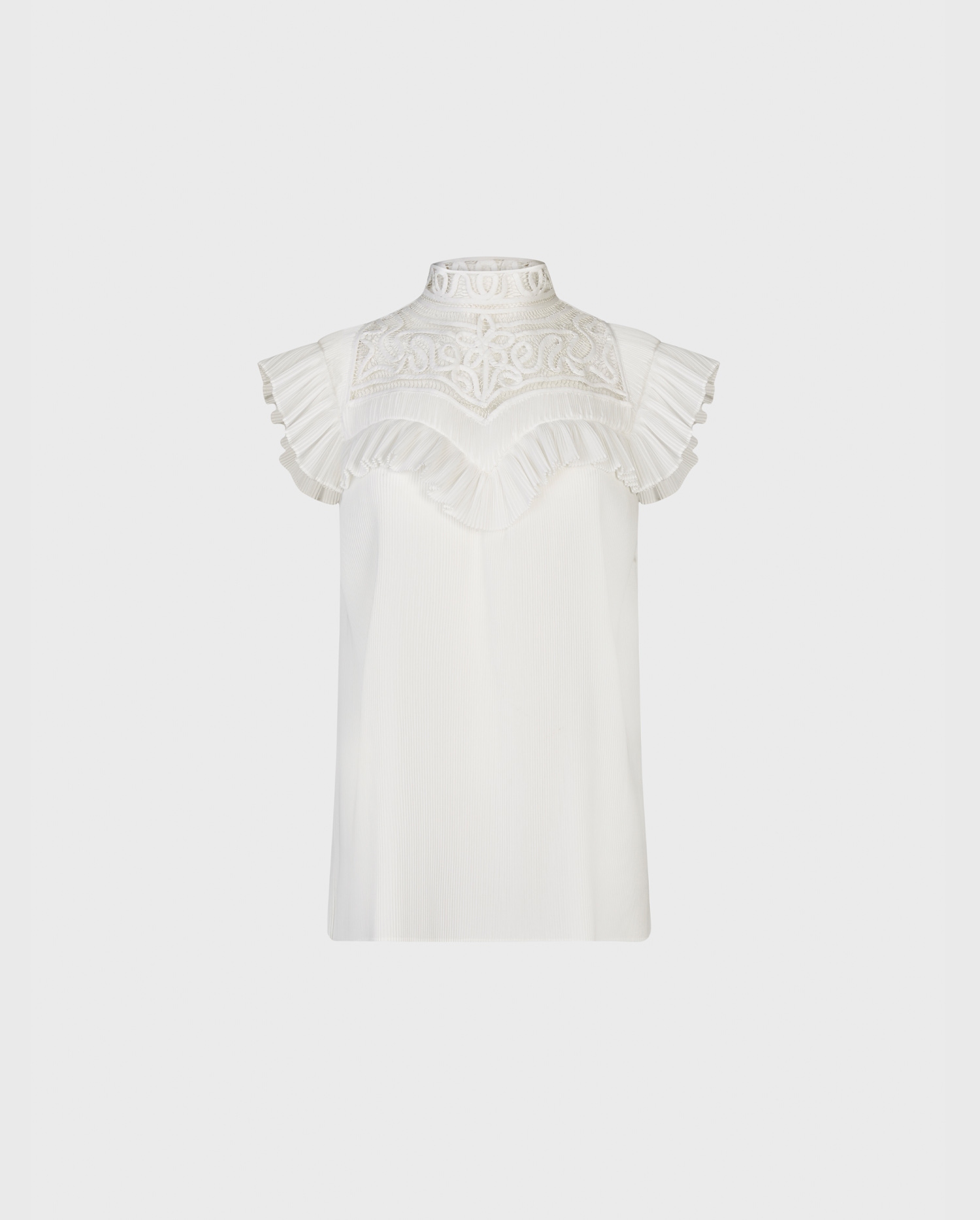 Discover the VELUCIA Sleeveless white blouse with delicate open scroll work design from ANNE FONTAINE