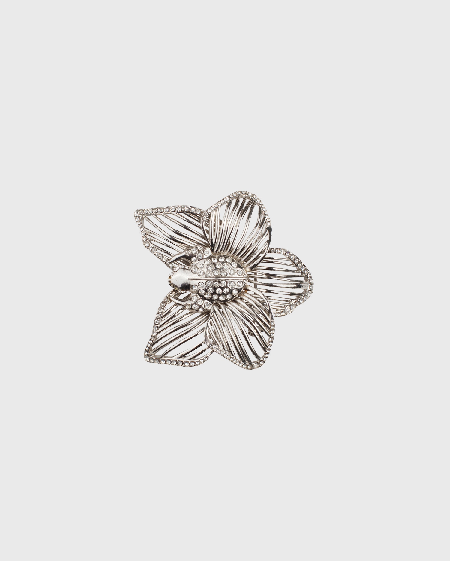 Discover the VITA Brass openwork flower brooch with rhinestones from ANNE FONTAINE