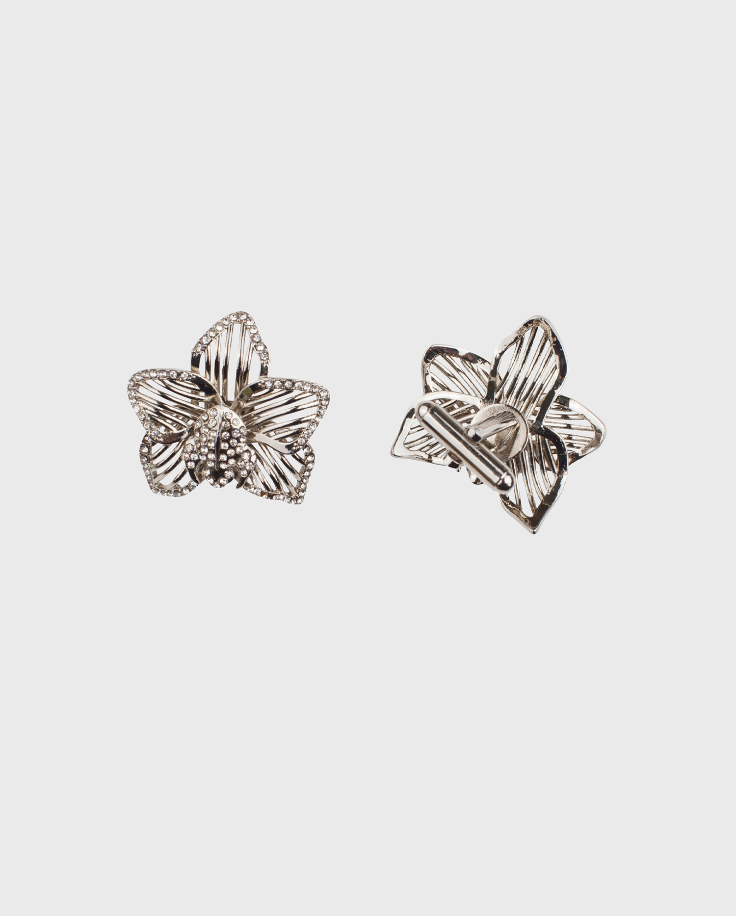 Discover the VIVA Brass openwork flower cufflinks from ANNE FONTAINE