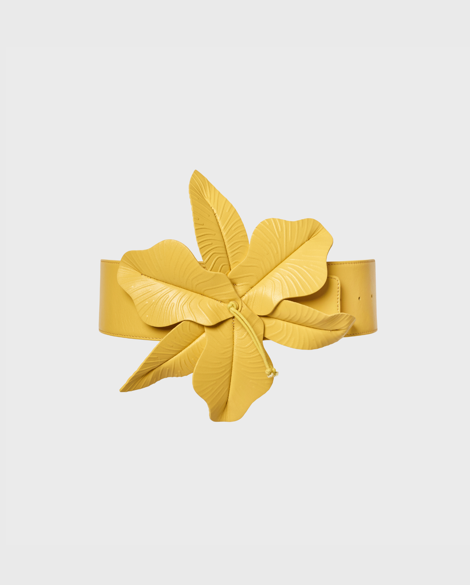Discover the CARRIE Yellow Wide Leather Belt With Oversized Floral Motif