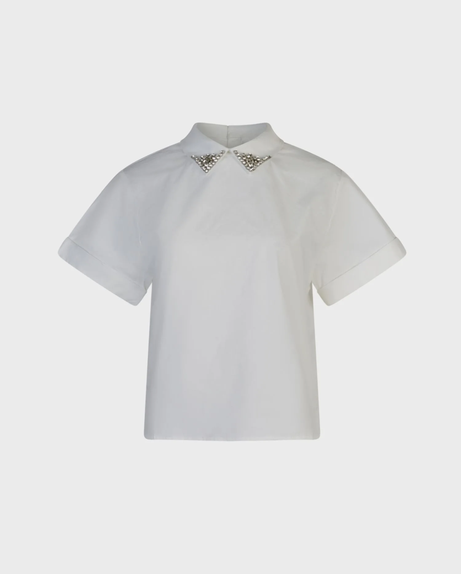 Discover the BASTIDE cropped white blouse with crystal enhanced collar from ANNE FONTAINE