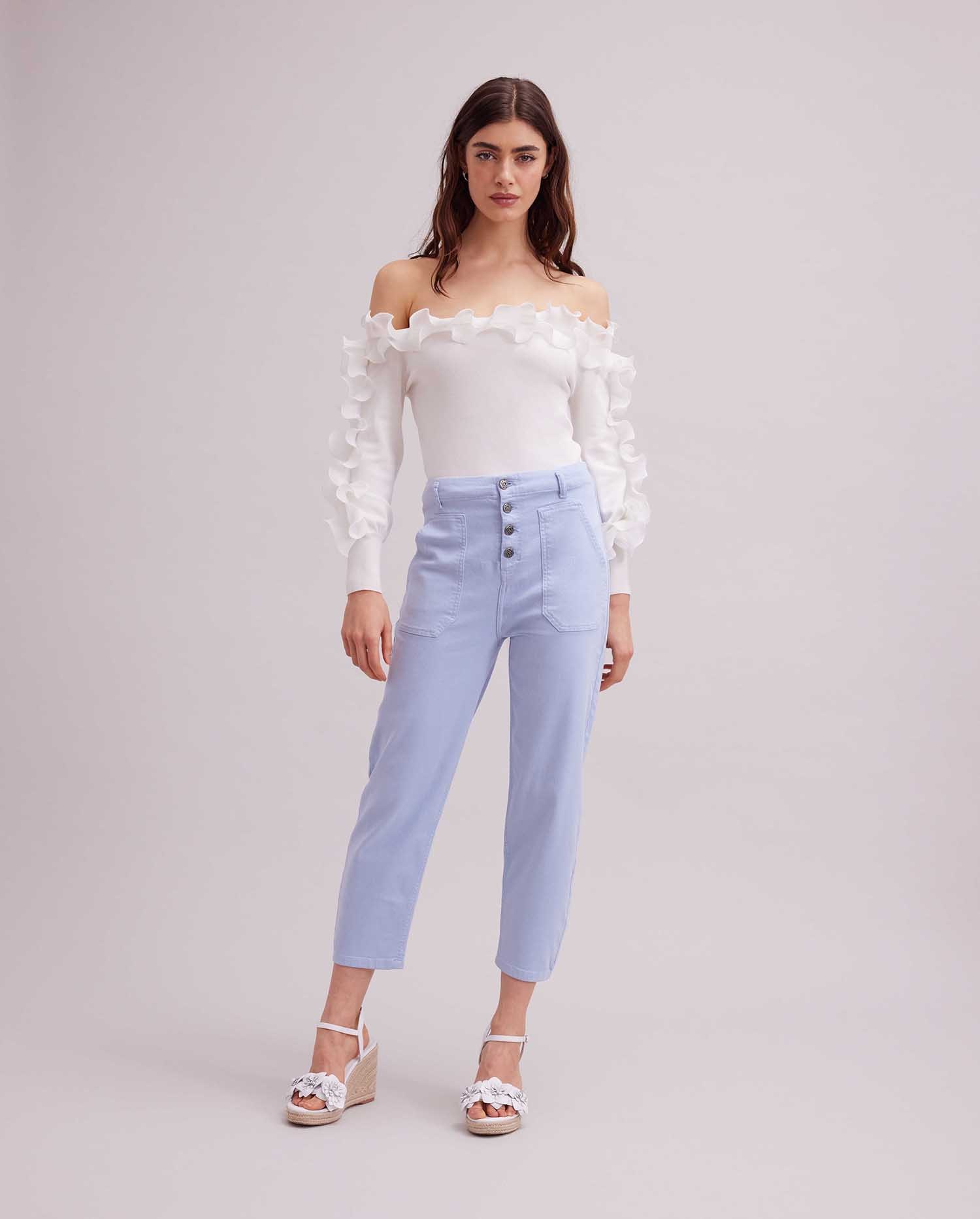 Discover the CATANE Long Sleeve White Pullover Knit With White Ruffle Details