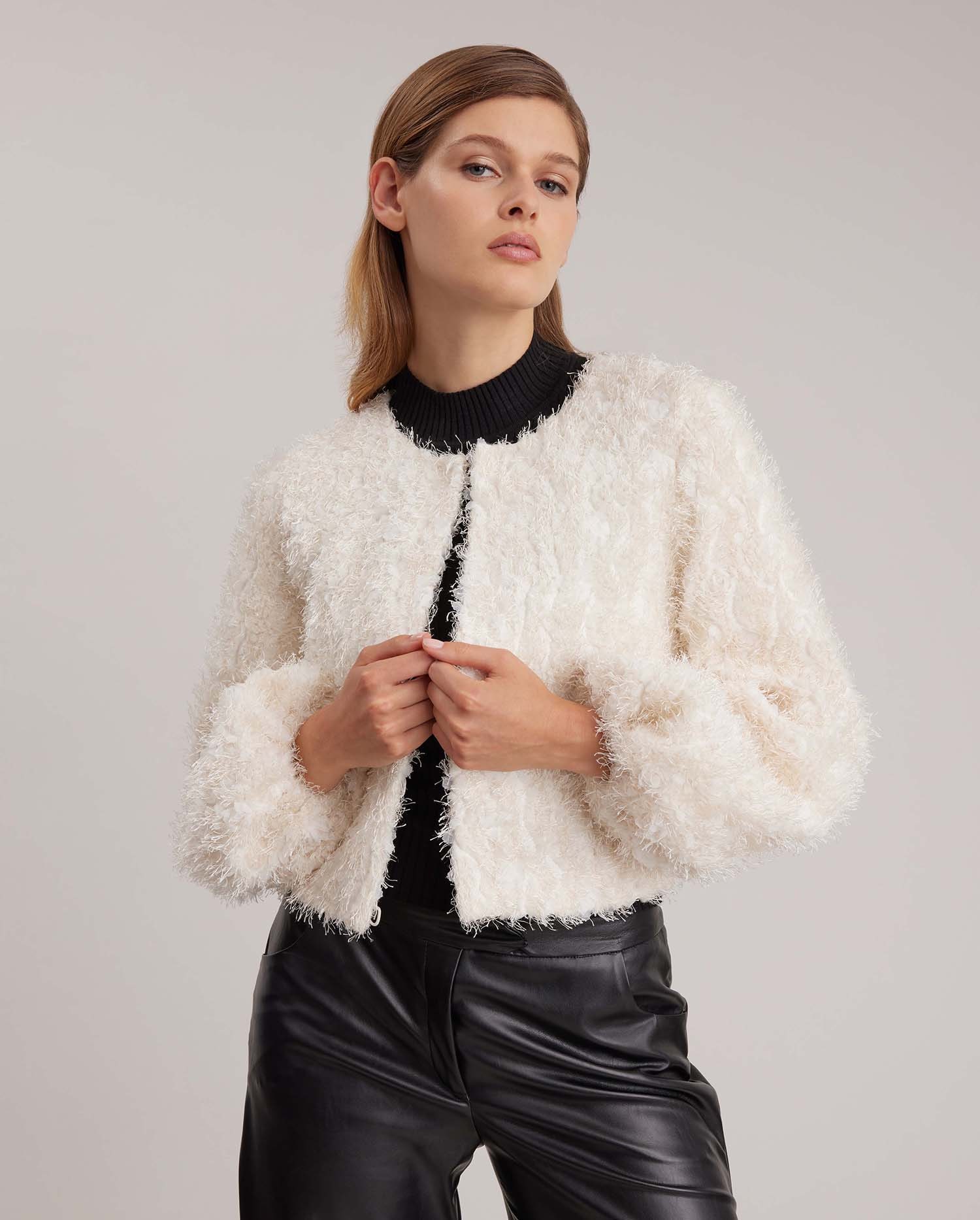 Discover the FLORE White Cropped Boxy Jacket With Balloon Sleeves