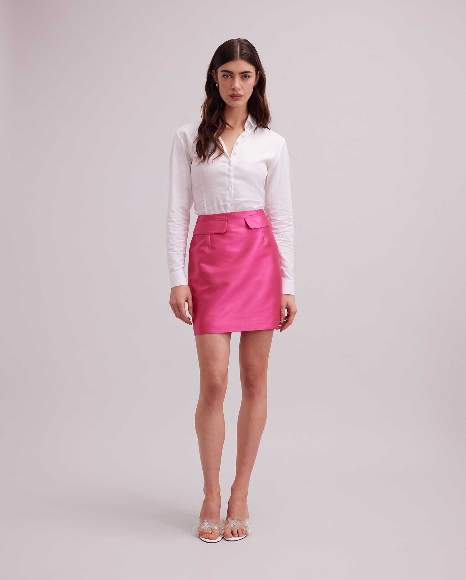 Discover the FRANCOISE Fuchsia Satin Mini Skirt With Flap Pockets