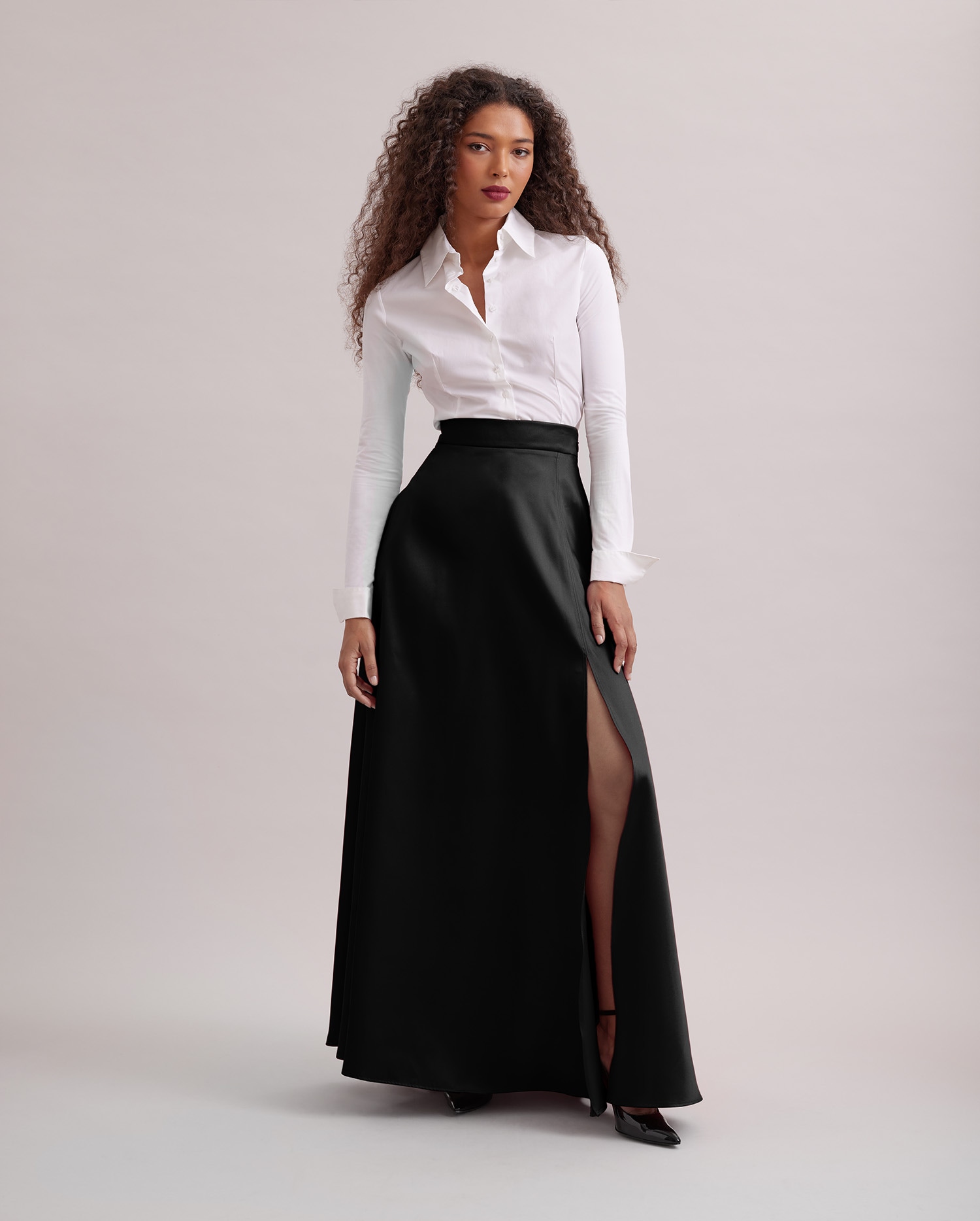 Discover The JOYCE black satin full skirt from ANNE FONTAINE