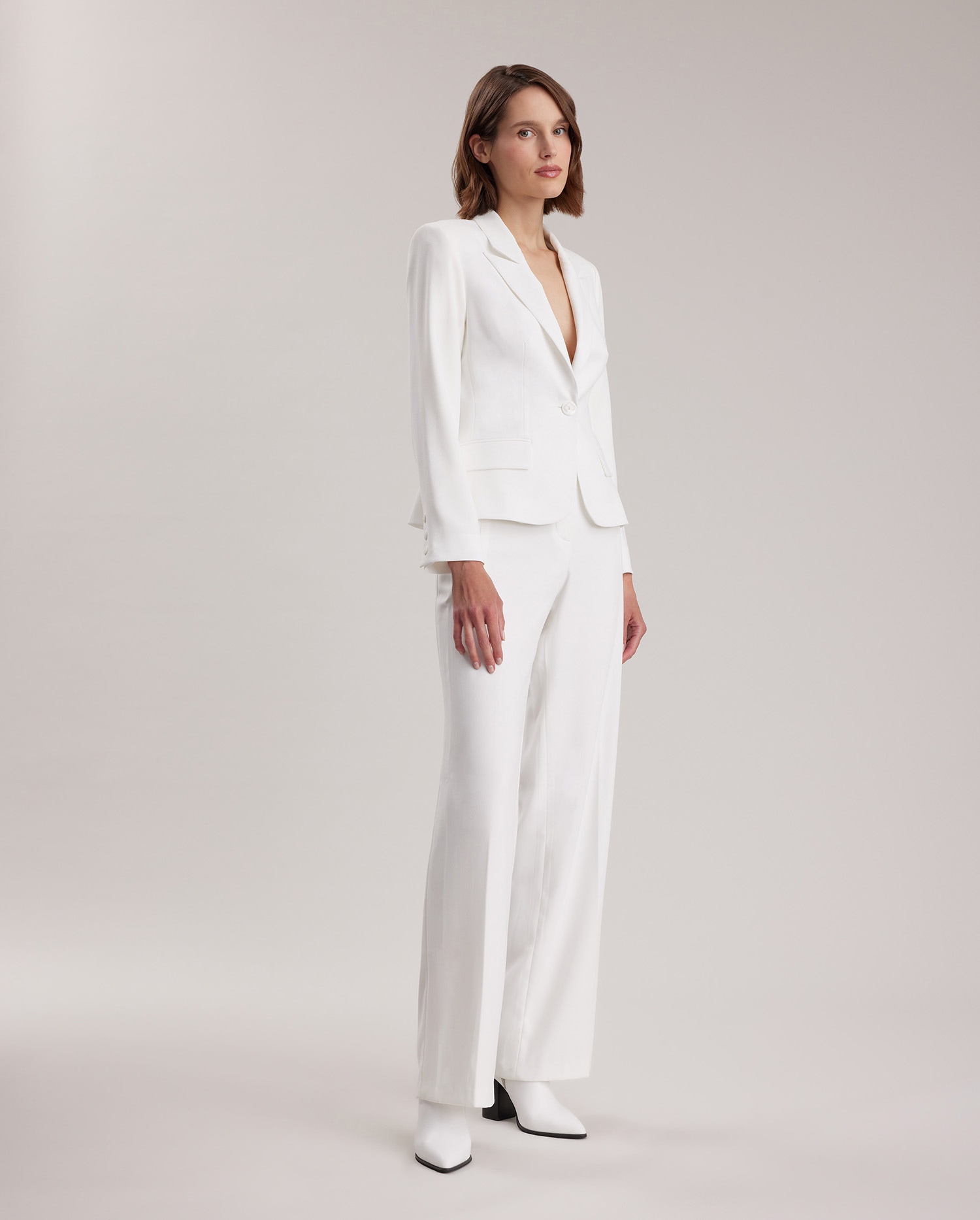 Discover The LIDO Off-White Textured Crepe Jacket With Geometric Button from ANNE FONTAINE