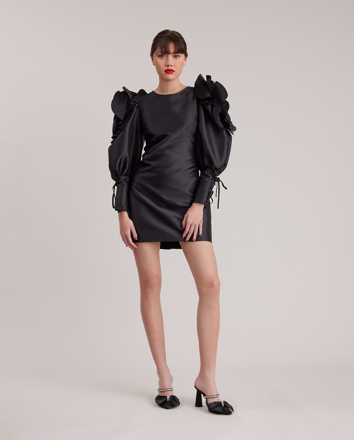 Discover the MONACO Long Sleeve Black Silk Dress Adorned With Ruffled Details