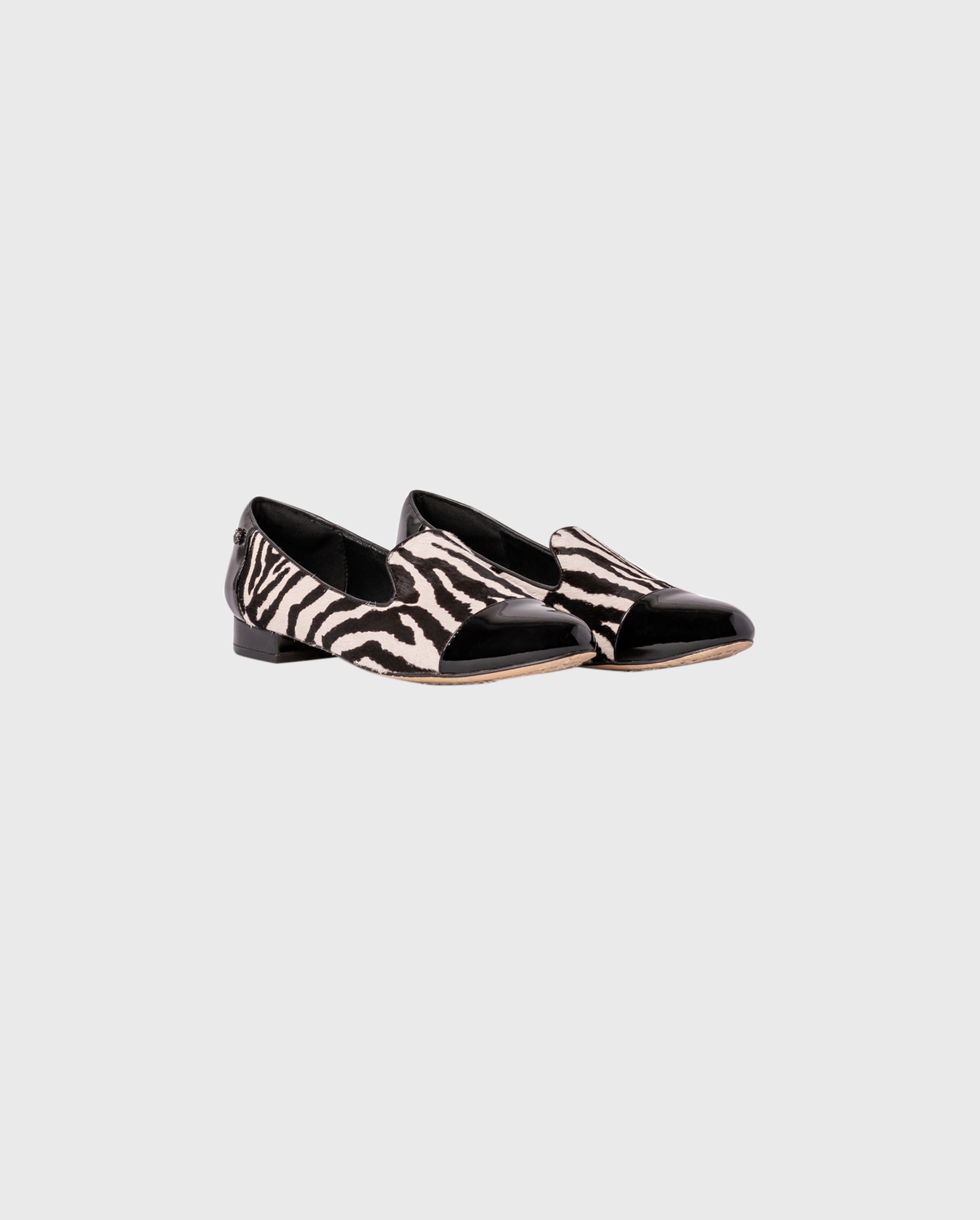 Discover the ORTIZ zebra loafers from ANNE FONTAINE