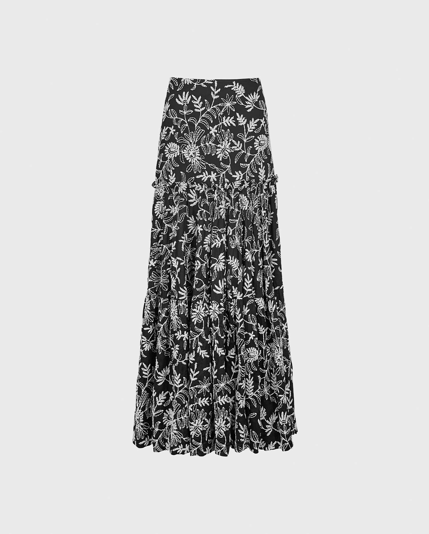 Discover the ROMARIN Maxi Skirt With Black and White Floral Embroidery Design from ANNE FONTAINE