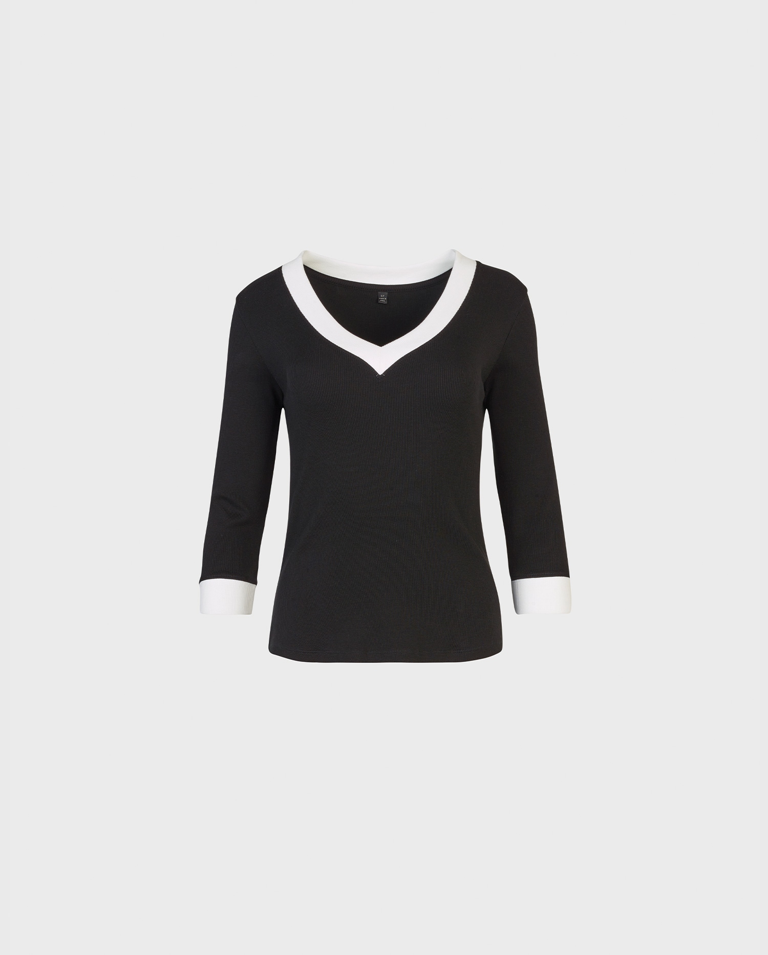 Discover the SOL Black 3/4 Sleeve Ribbed Top With White Contrast Trims from ANNE FONTAINE