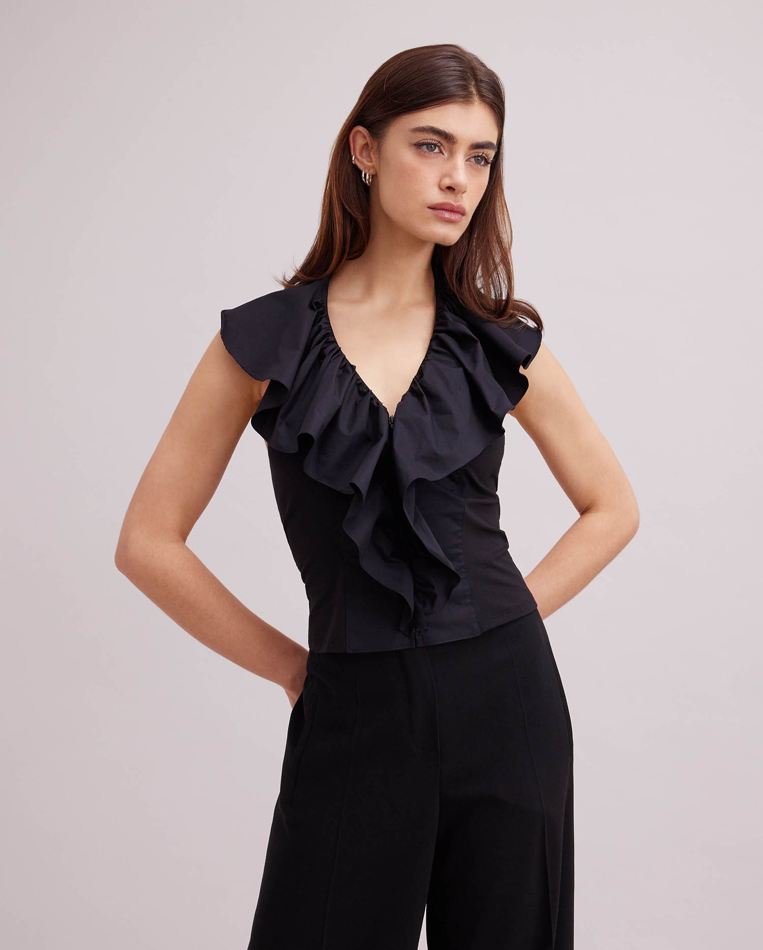 Discover the VANES Black Sleeveless Poplin Halter Top With Cascading Ruffle from ANNE FONTAINE