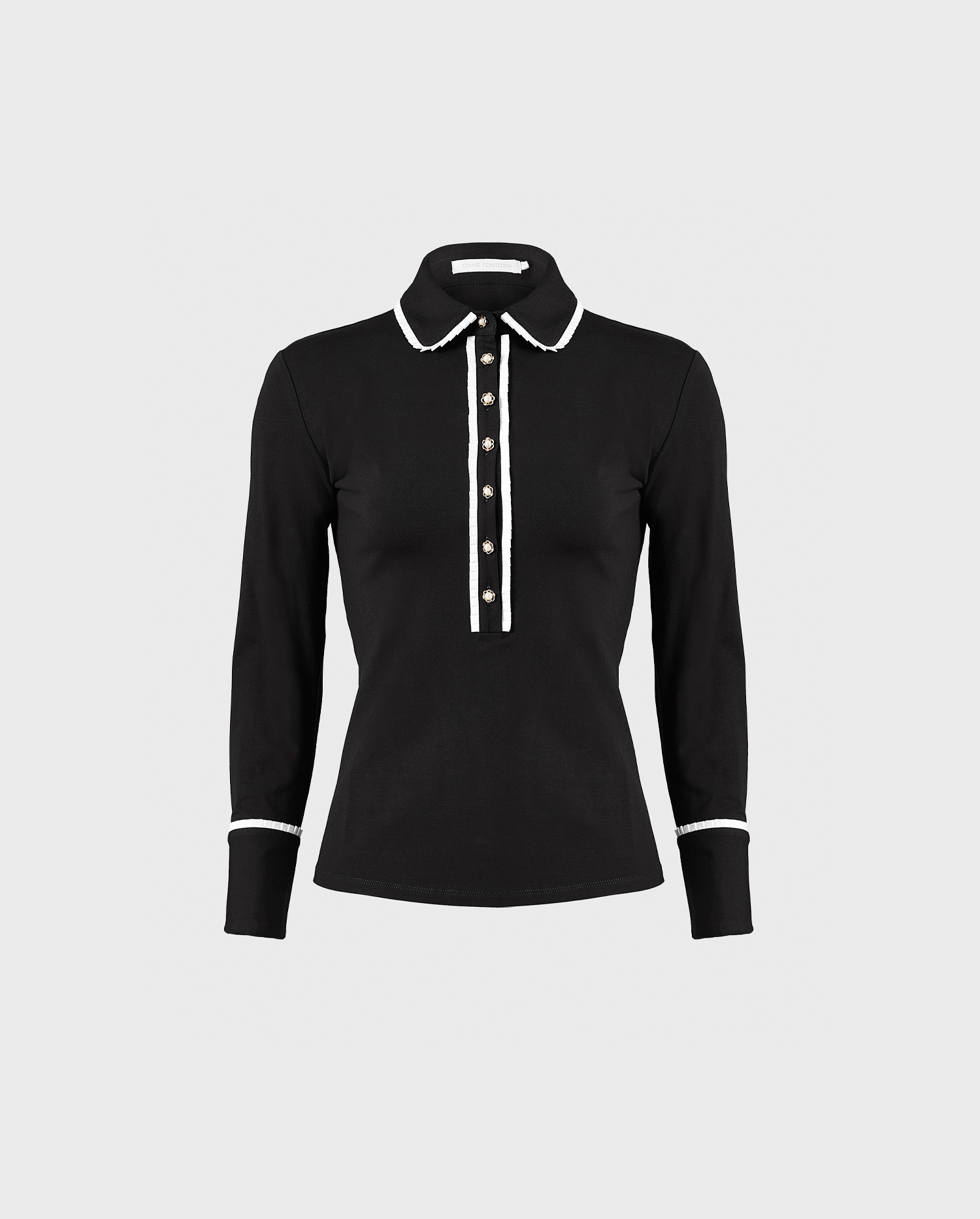 Discover The FAUSTINE black cotton jerey shirt with white details from ANNE FONTAINE