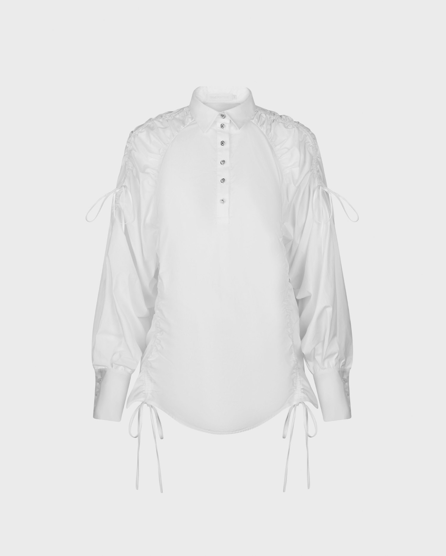 Discover the INDIANA oversized white long sleeve shirt with drawstrings from ANNE FONTAINE