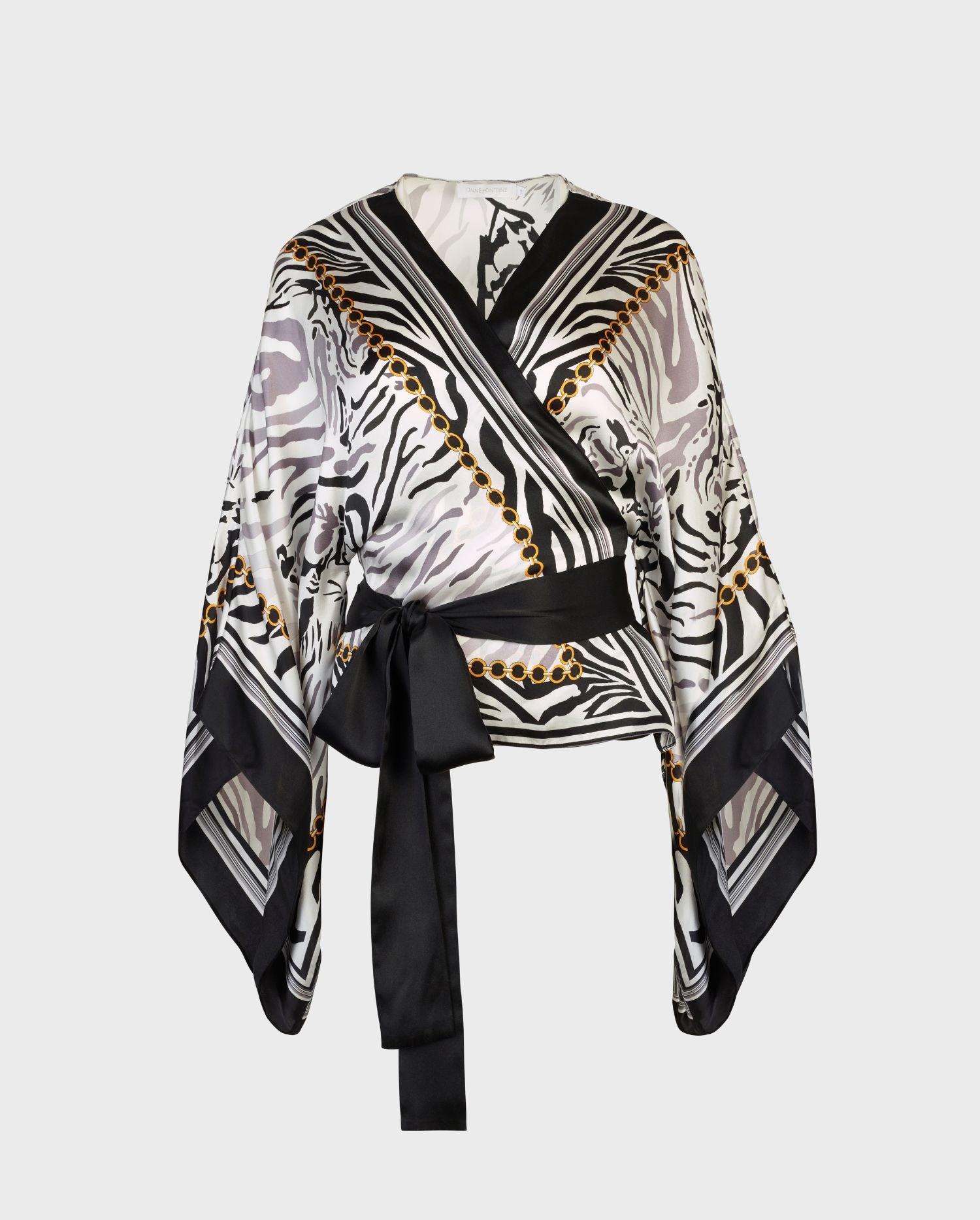 Discover the SCULPTURE black and white silk zebra kimono from ANNE FONTAINE