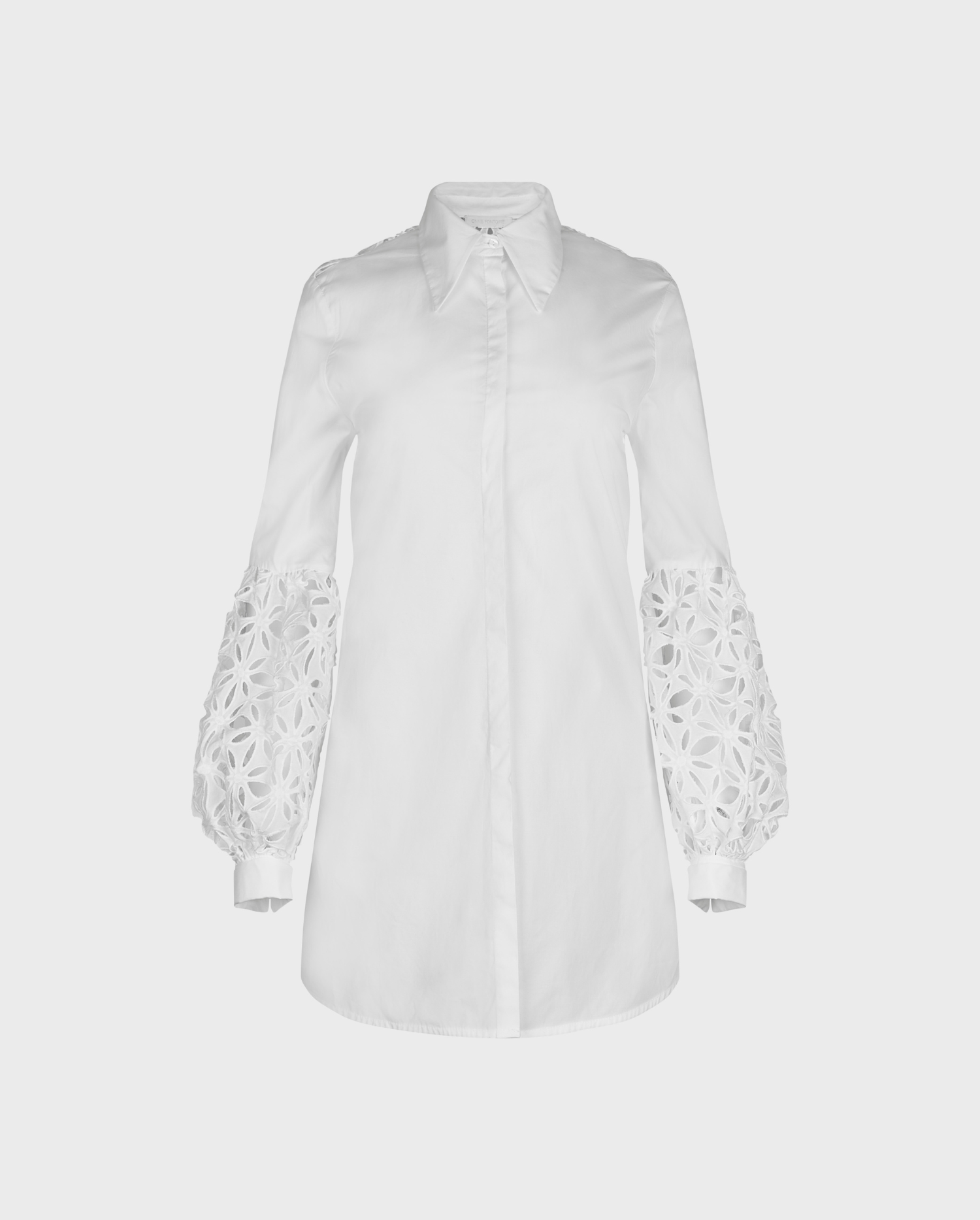 Discover the VALLAURIS White Longline Shirt With Eyelet Sleeve Details from ANNE FONTAINE