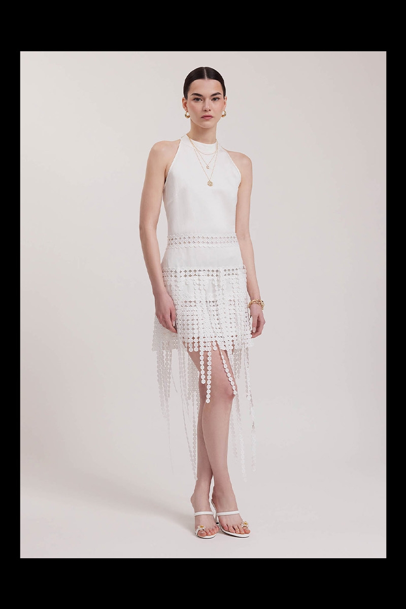 Discover the ALTHEA White Halter Cut Fringe Dress With Circle Lace Inserts from designer ANNE FONTAINE