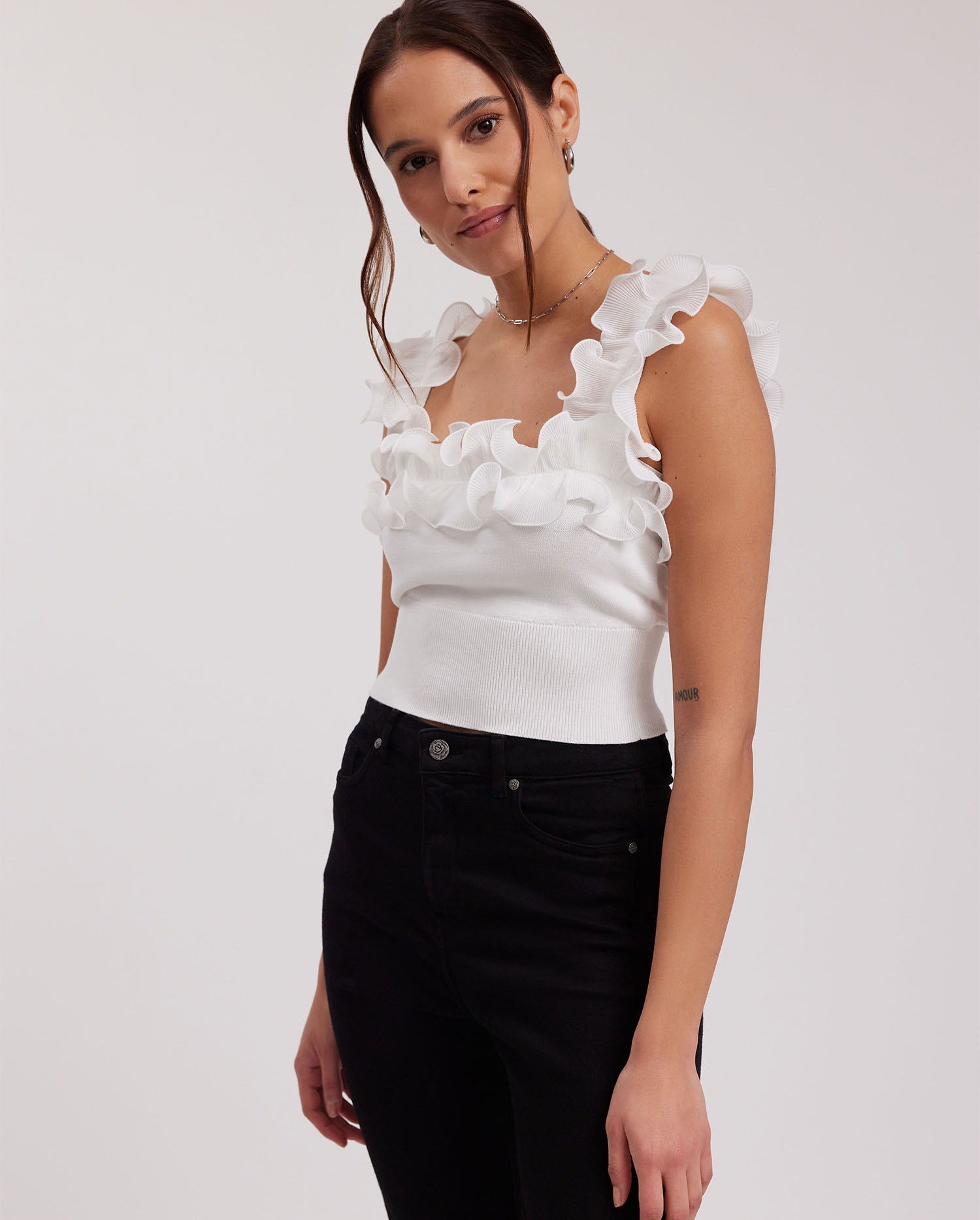 Discover the AMANDE White Knit Pullover Crop Top With Ruffle Straps from ANNE FONTAINE