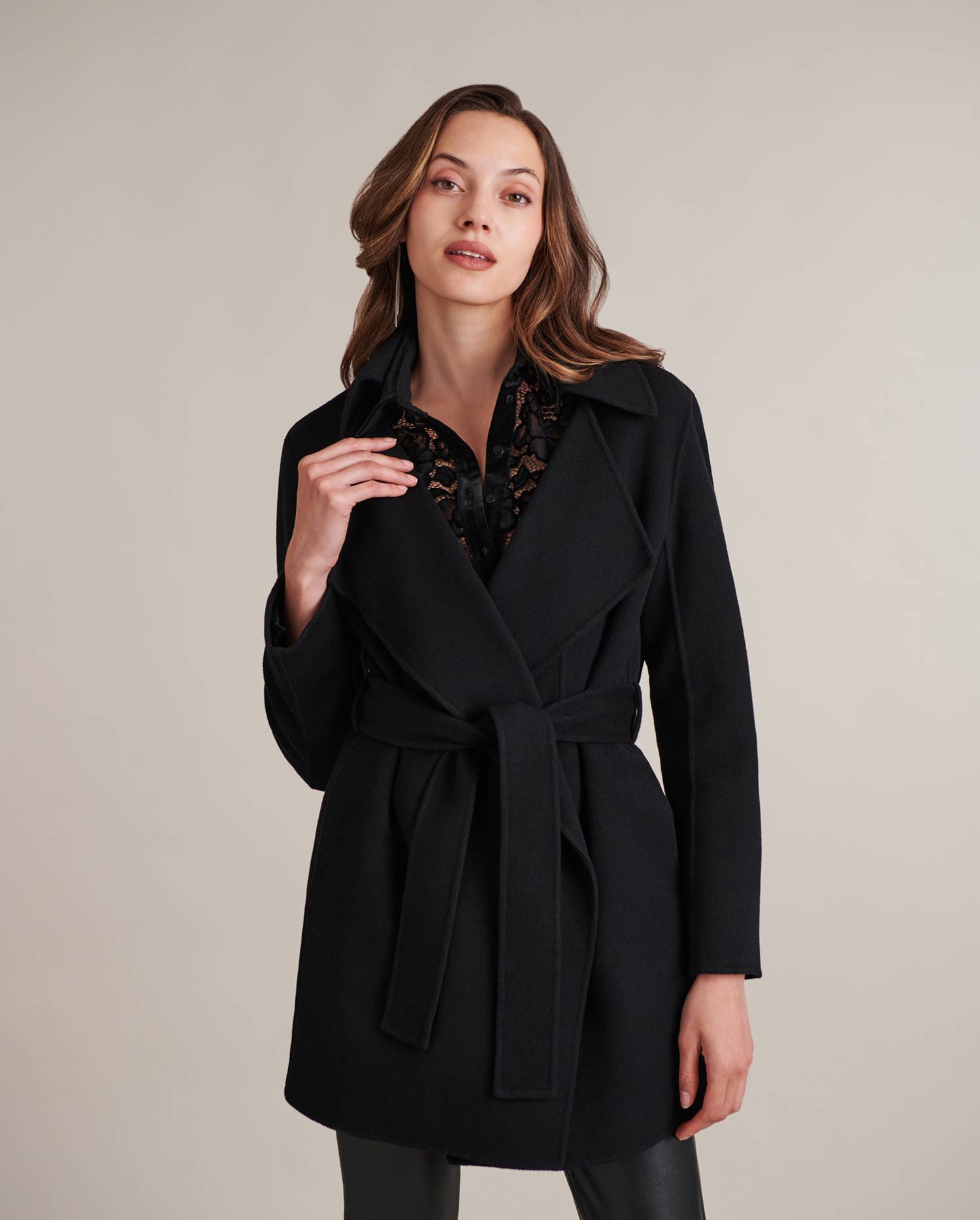 Discover the DELACROIX Black Belted Open Wool Blend Coat With Large Notched Lapel