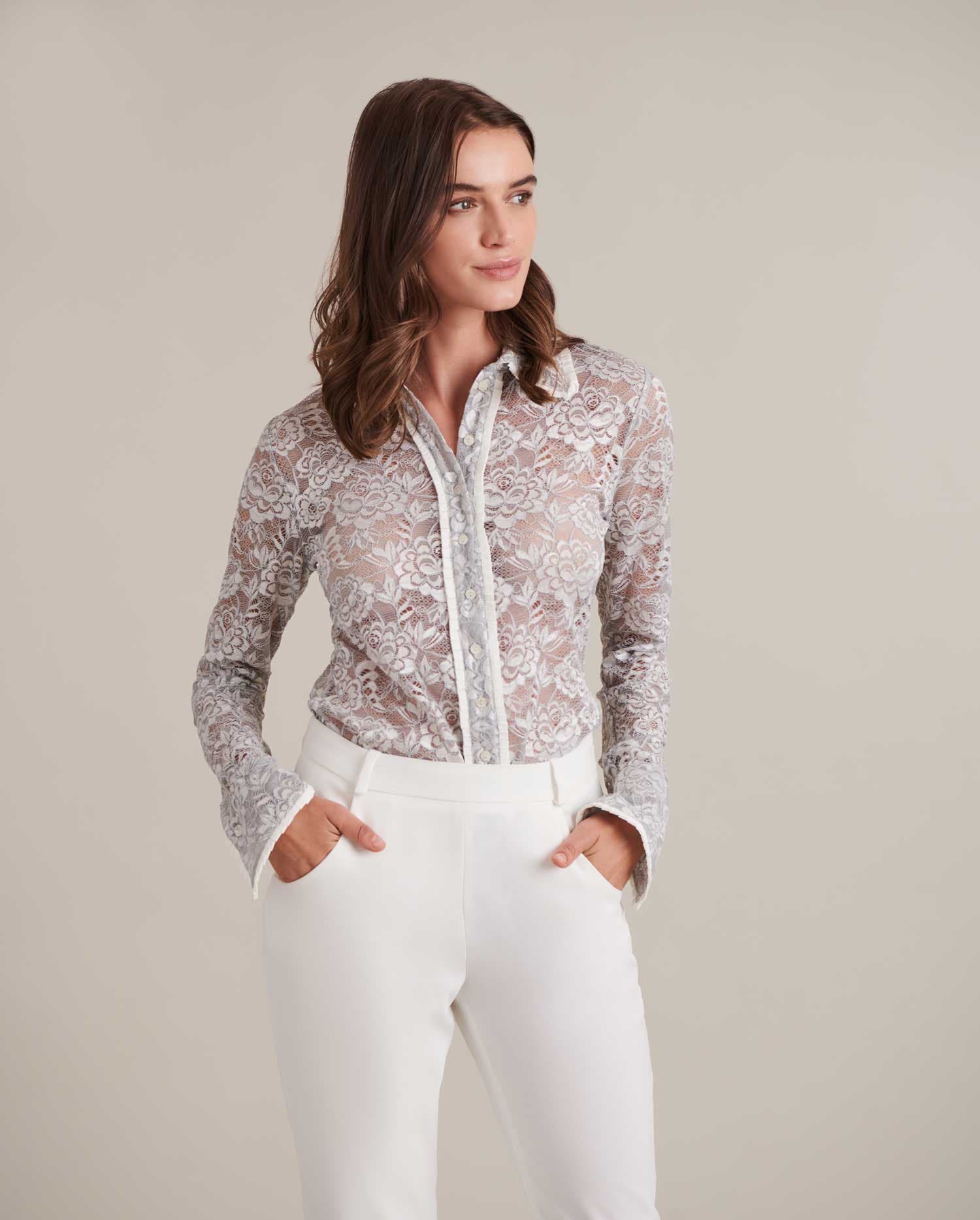 Elevate your style to new heights with designer Anne Fontaine's extraordinary collection of shirts and blouses. 