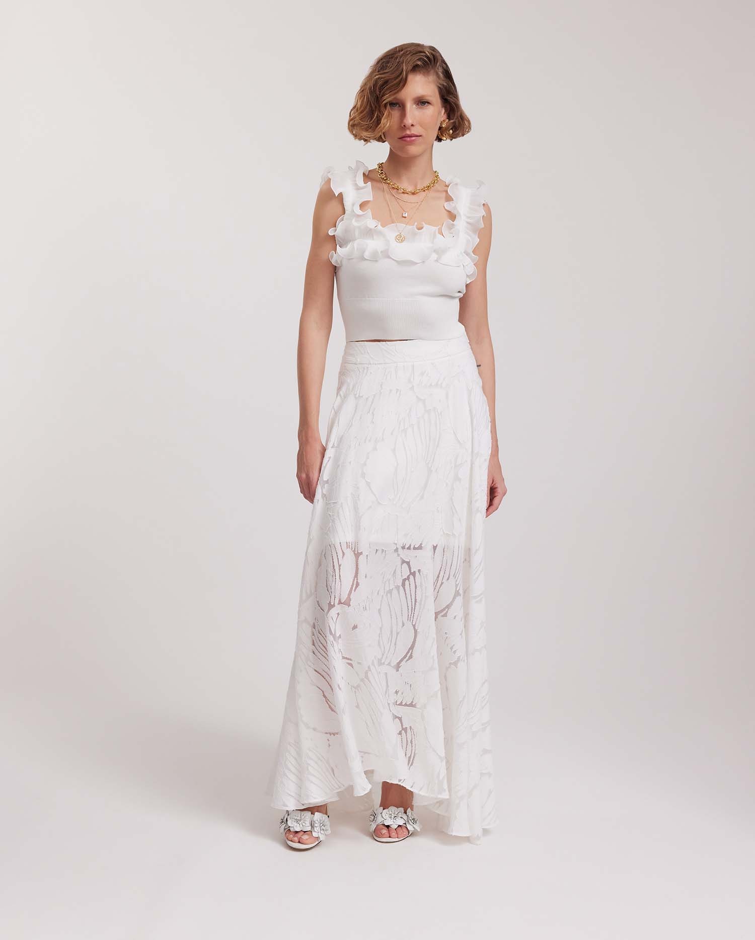 Discover the MARBRE White Maxi Skirt With Burnout Pattern and Handkerchief Hemline from ANNE FONTAINE