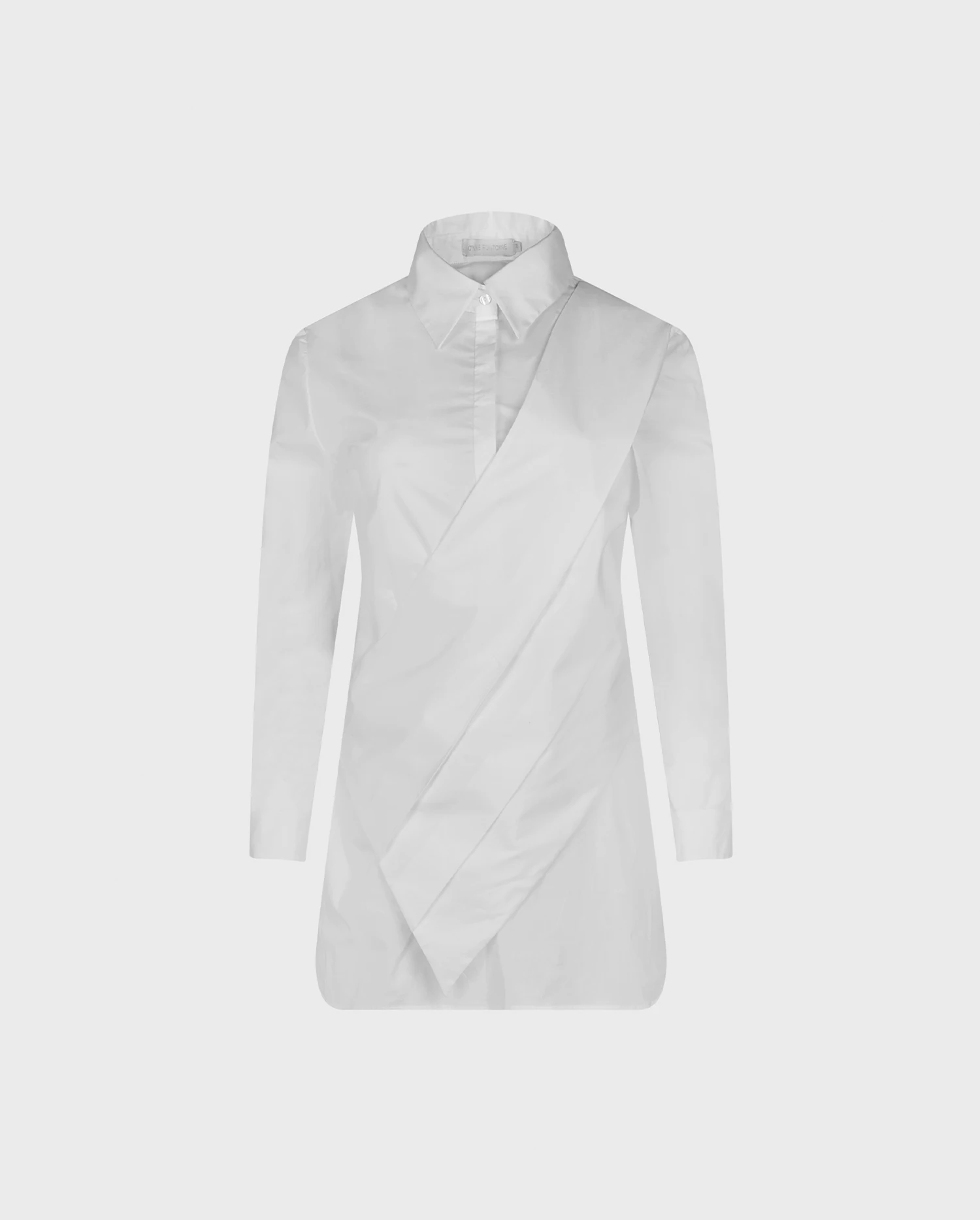 Discover the MONTMARTRE White Asymmetric Poplin Shirt With a Classic Point Collar and Half Button Placket from designer ANNE FONTAINE