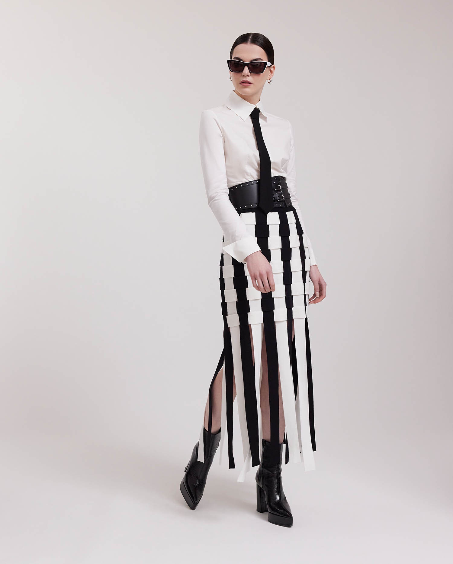 Discover the NINON Black & White Basket Weave Fringe Knit Skirt from ANNE FONTAINE