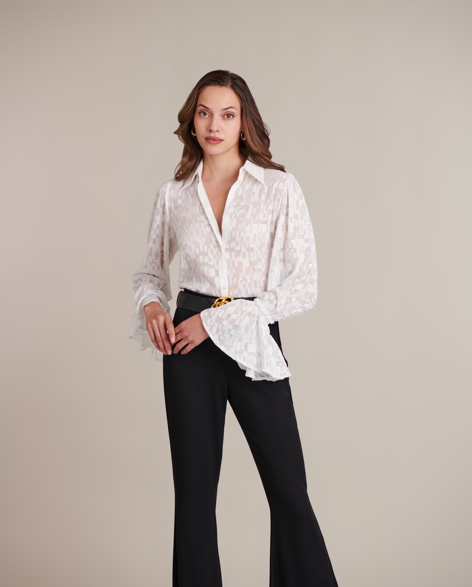 Elevate your style to new heights with designer Anne Fontaine's extraordinary collection of shirts and blouses.