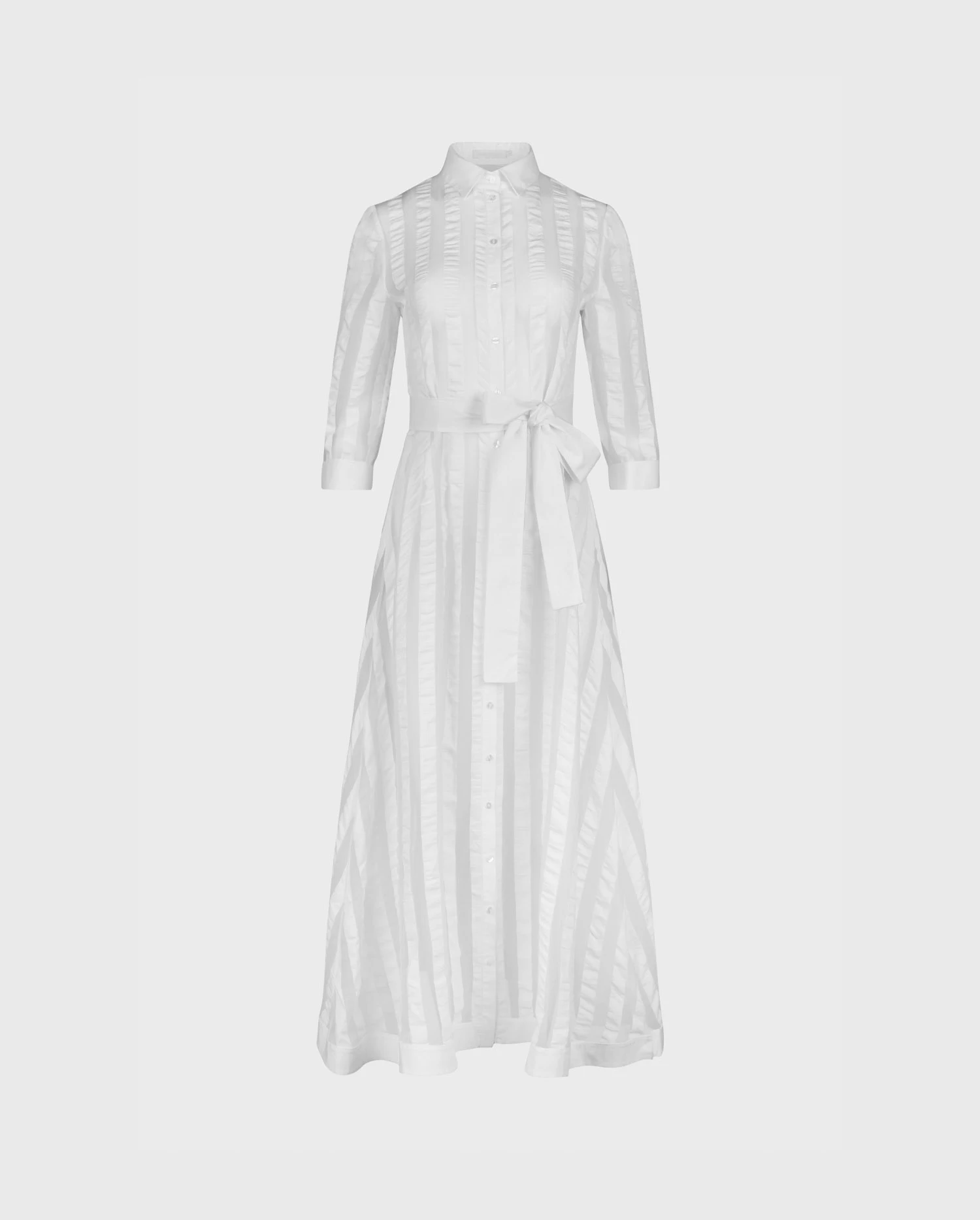 Discover the Bidart White 3/4 Sleeve Long Sheer Dress with Vertical Stripe Panels and Tie Waist Belt from designer ANNE FONTAINE