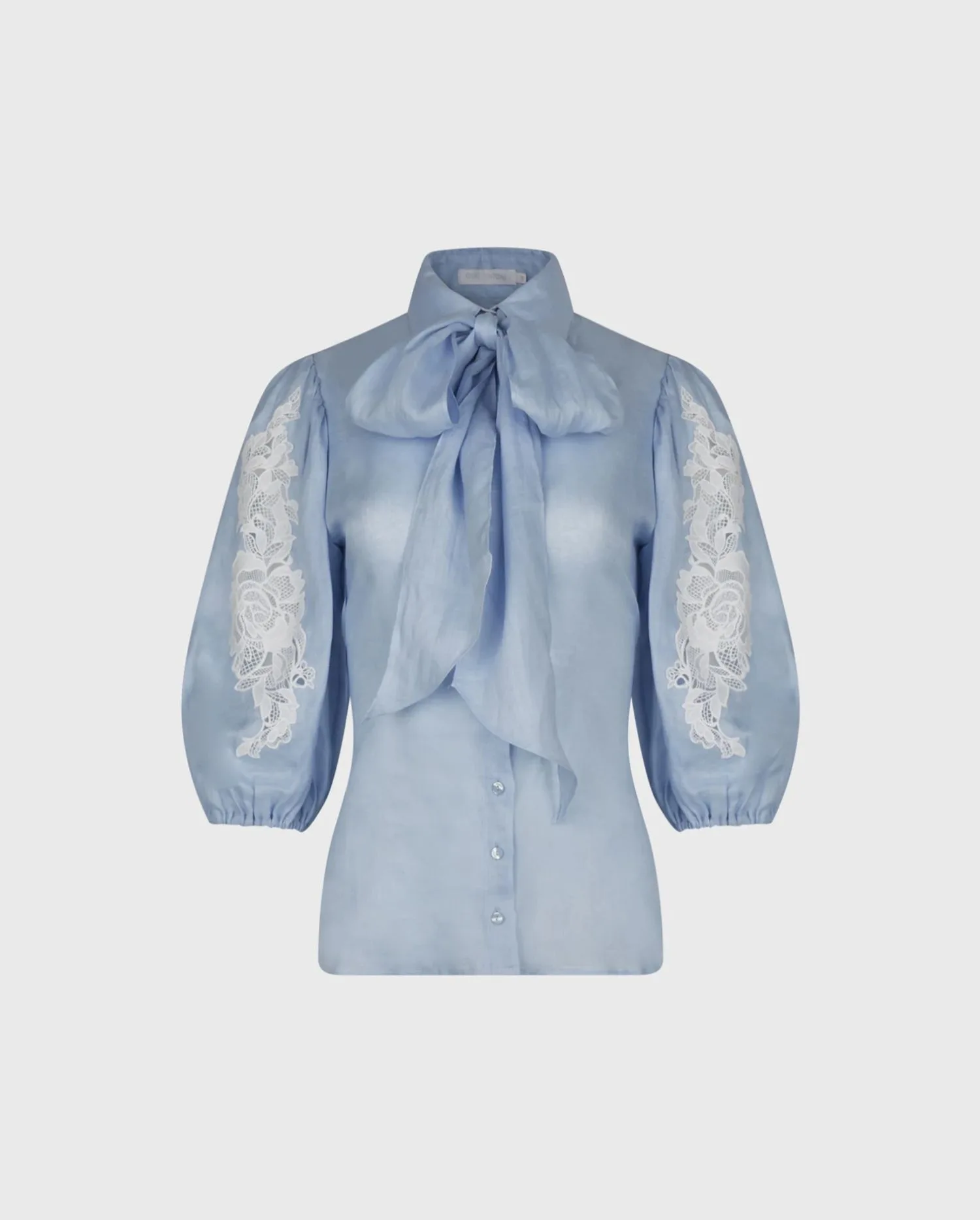 Discover the Abbie Light Blue Balloon Sleeve Linen Shirt With Lace Inserts and Removable Neck Tie from designer Anne Fontaine